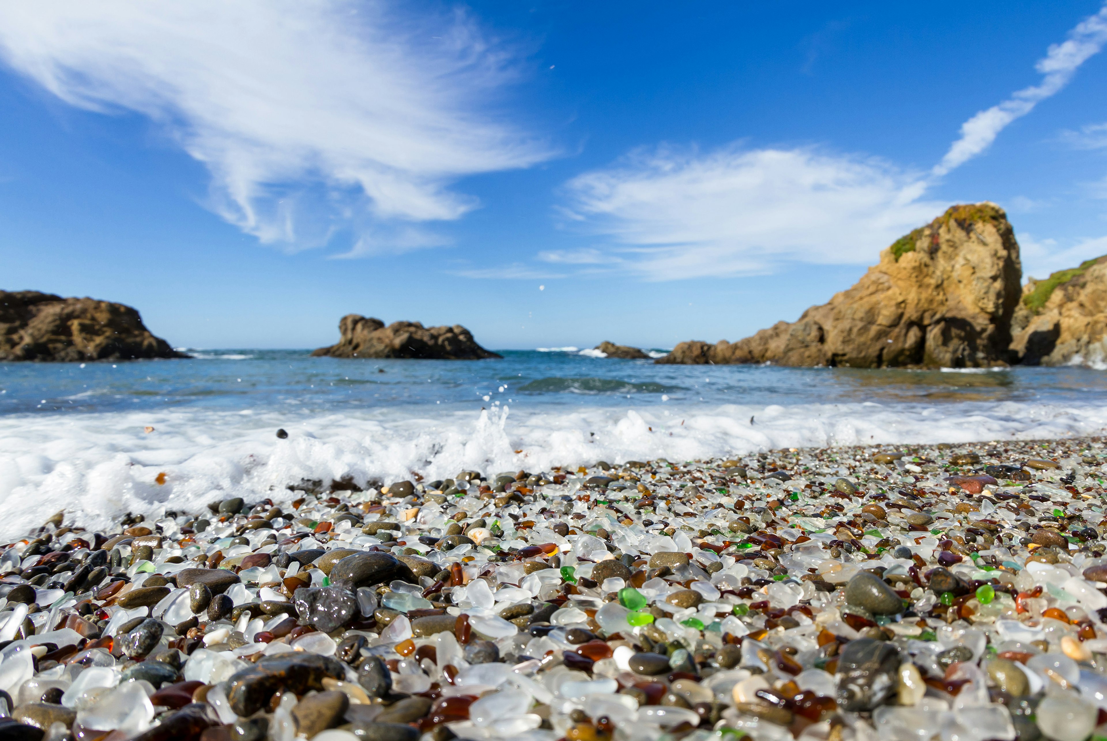 colorful glass pebbles blanket this beach in Fort Bragg, the beach was used as a garbage dump years ago, nature has tumbled the glass and polished it making it a tourist destination
542263321
coastal, coast, destination, natural, green, rocks, eco, years, travel, wonder, red, salt, recycle, ecology, fort, dumpster, waves, pebbles, explore, pacific, dump, california, beach, color, blue, erosion, motion, beauty, garbage, scenic, tourism, sea, water, nature, bragg, ecological, ultimate, landscape, glass, seaglass