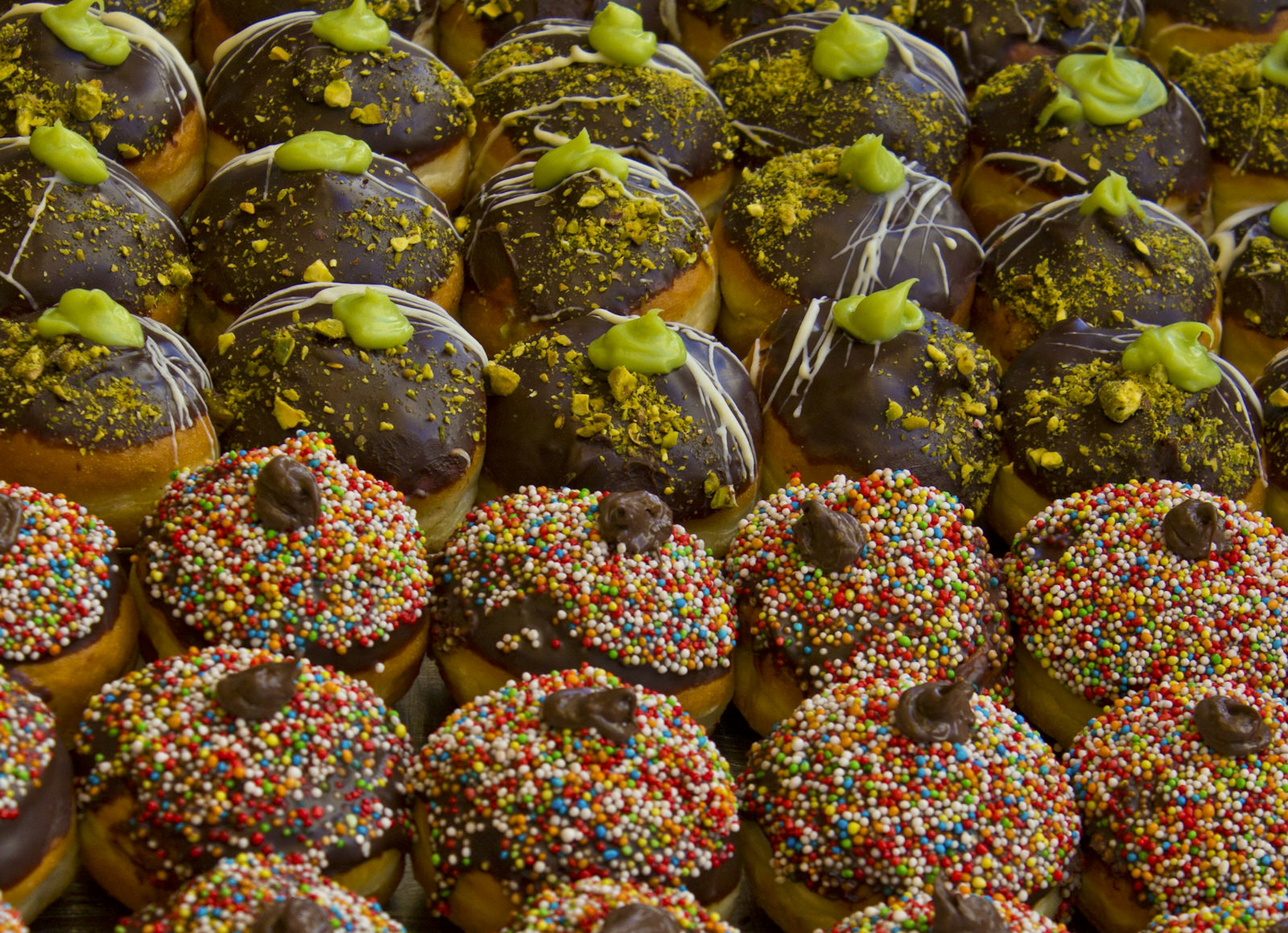 Selection of doughnuts on display to celebrate Jewish festival of Hanukkah in Tel Aviv, Israel, Middle East