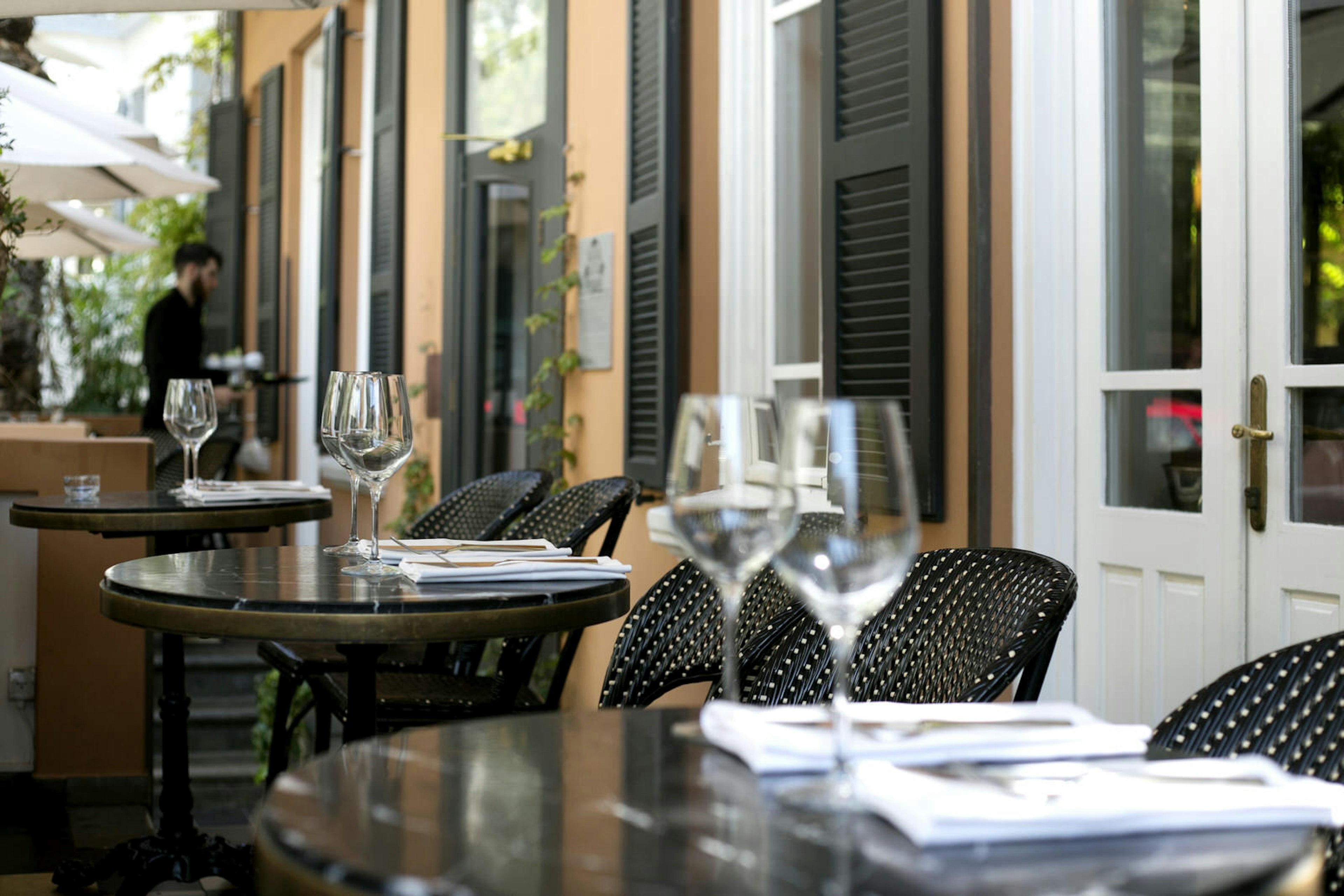 A row of tables at Hotel Montefiore, Tel Aviv