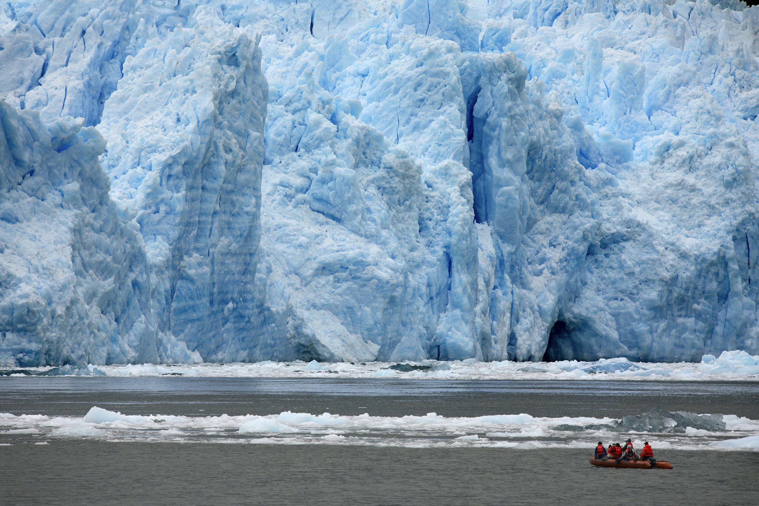 Adventure Tourism. Tourists in a zodiac view the terminus of the San Rafael Glacier in Patagonia in southern Chile in South America.
523826442
Surrounding Wall, Travel, Tourism, Wilderness Area, Extreme Terrain, Remote, Global Warming, Arrival, San Rafael Glacier, Crevasse, Frozen, Craft, Melting, Cracked, Scenics, Cold - Temperature, Large, Adventure, Motion, Environment, Travel Destinations, Nature, Tourist, Patagonia - Chile, Chile, South America, Winter, Andes, Mountain, Landscape, Glacier, Ice, Nautical Vessel, froze, Adventure Tourism