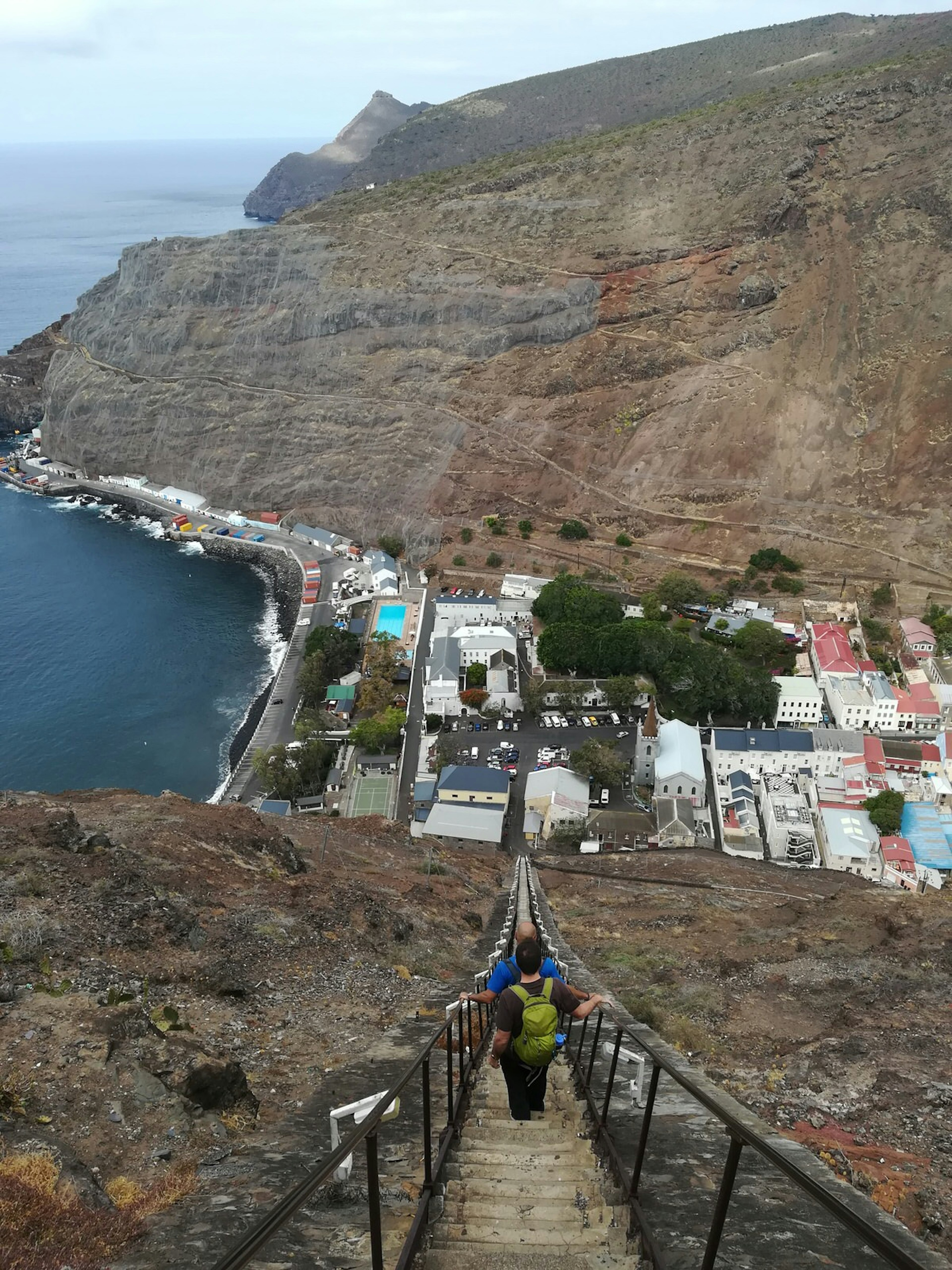 A view from the top of these steep steps that descend to Jamestown below; the city abuts the sea.