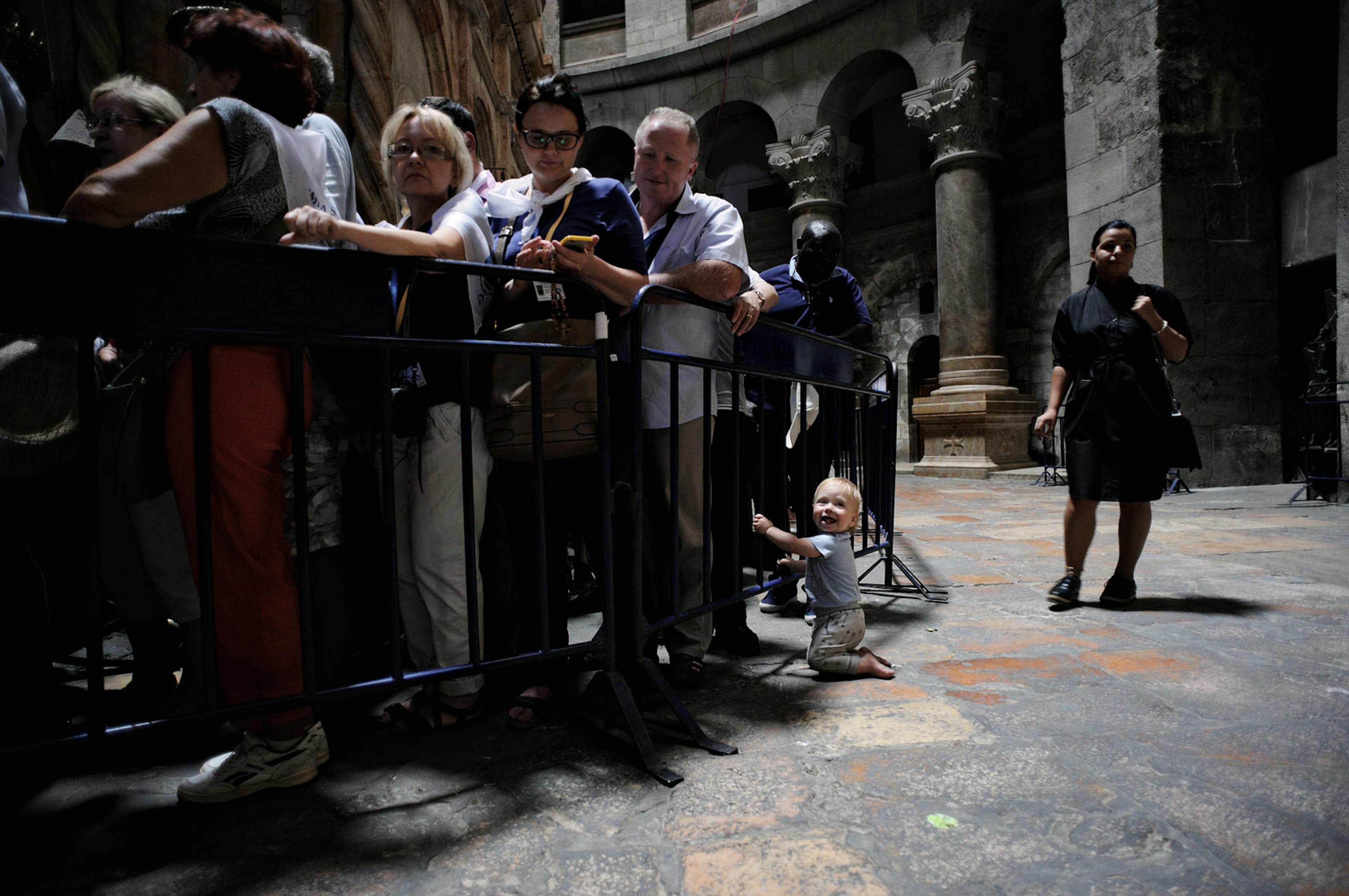 Travelling with children in Jerusalem to the Church of the Holy Sepulchre. Image by Jan Hon / Lonely Planet