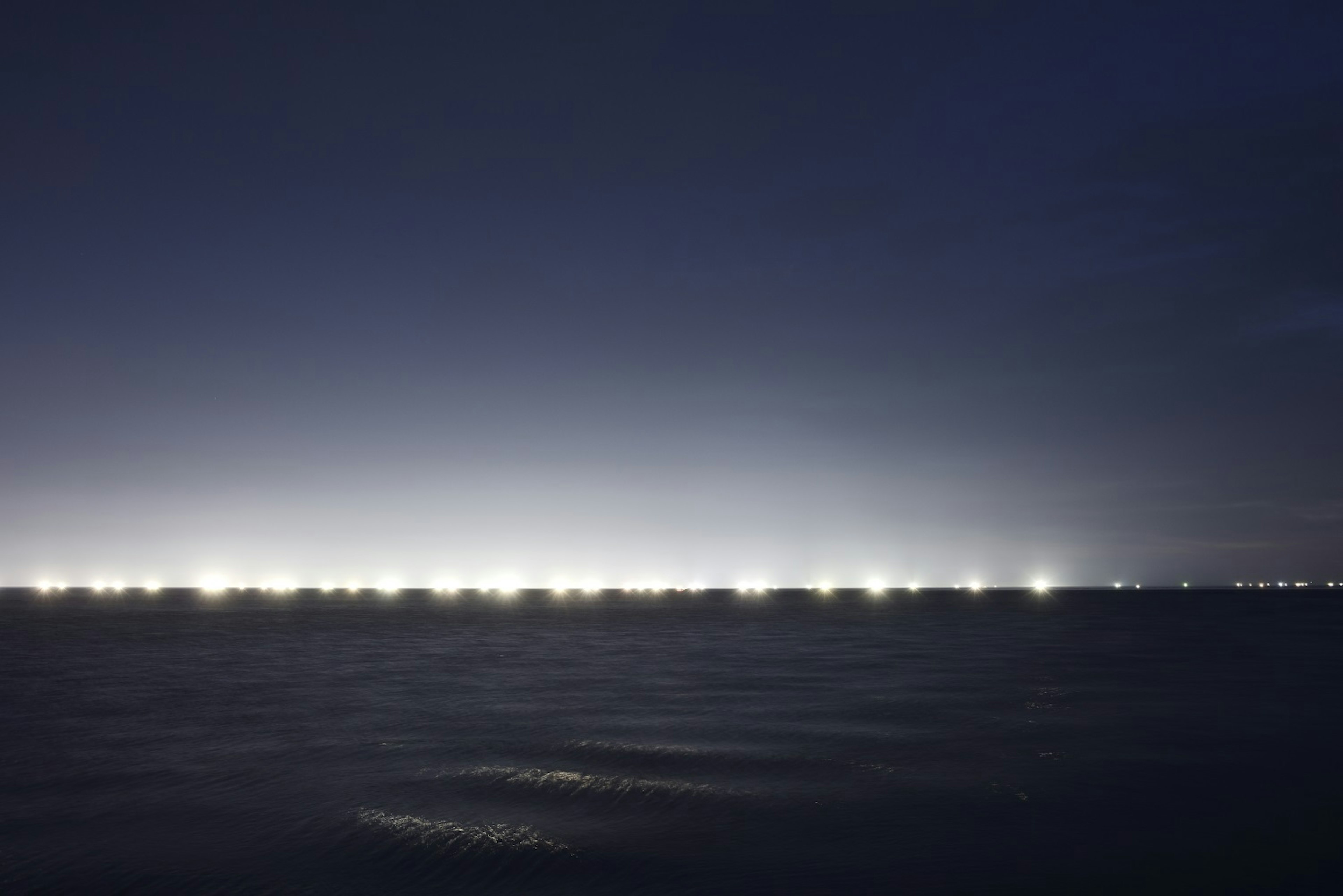 Night fishing boats light up the harbour of Rausu