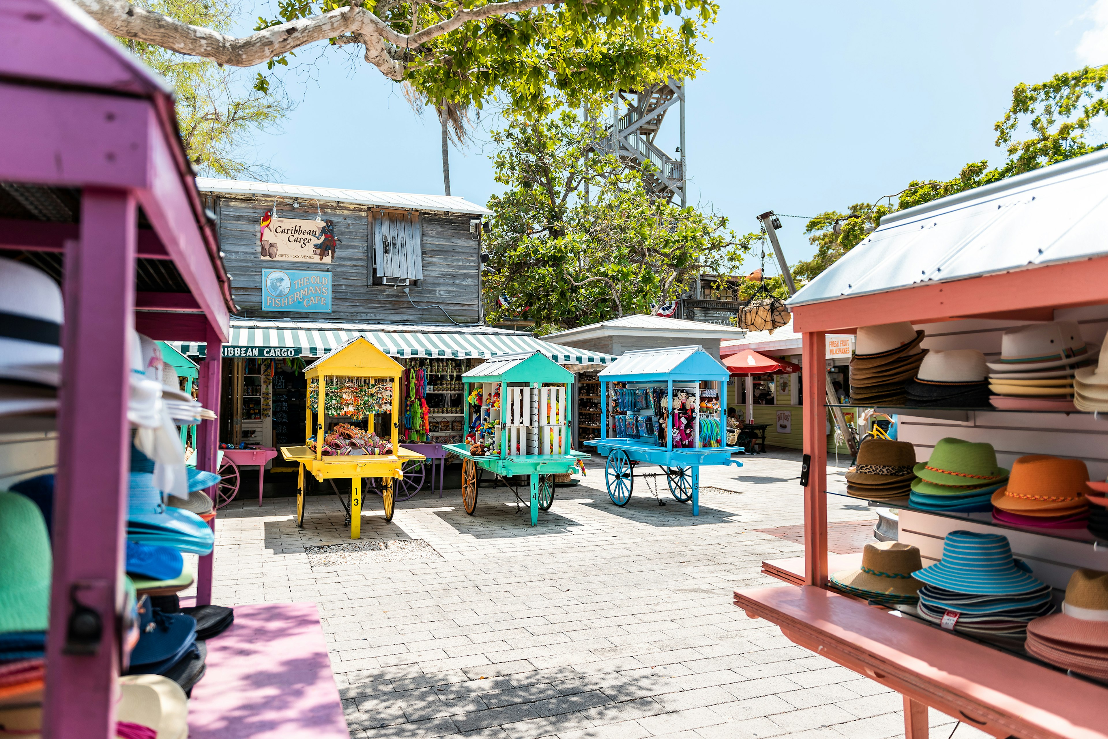 Key West, USA - May 1, 2018: Duval street Mallory Square shopping architecture with nobody in Florida city travel, sunny day, merchants vendors