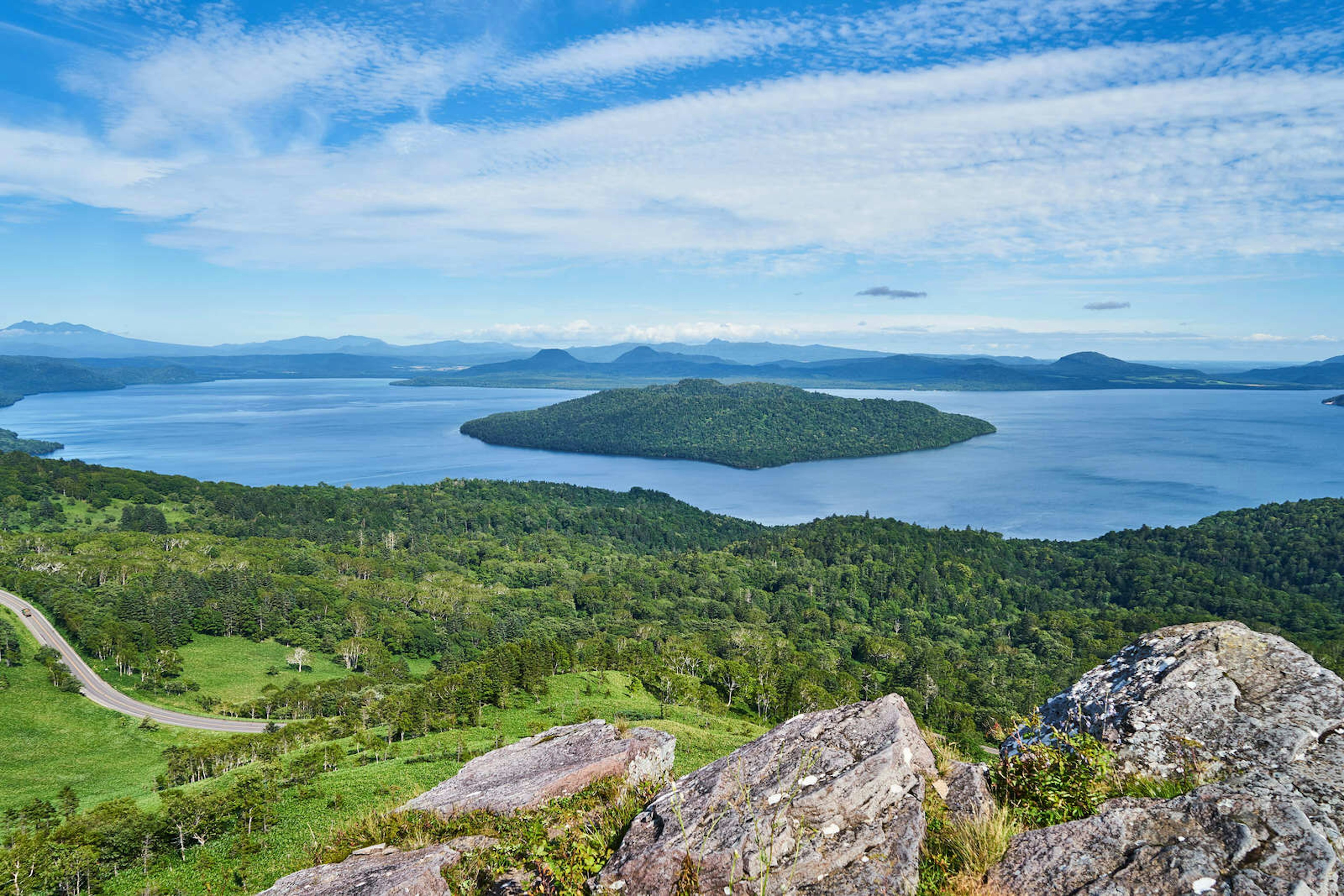 Wide view of caldera lake Kussharo-ko showing island Naka-jima in the centre