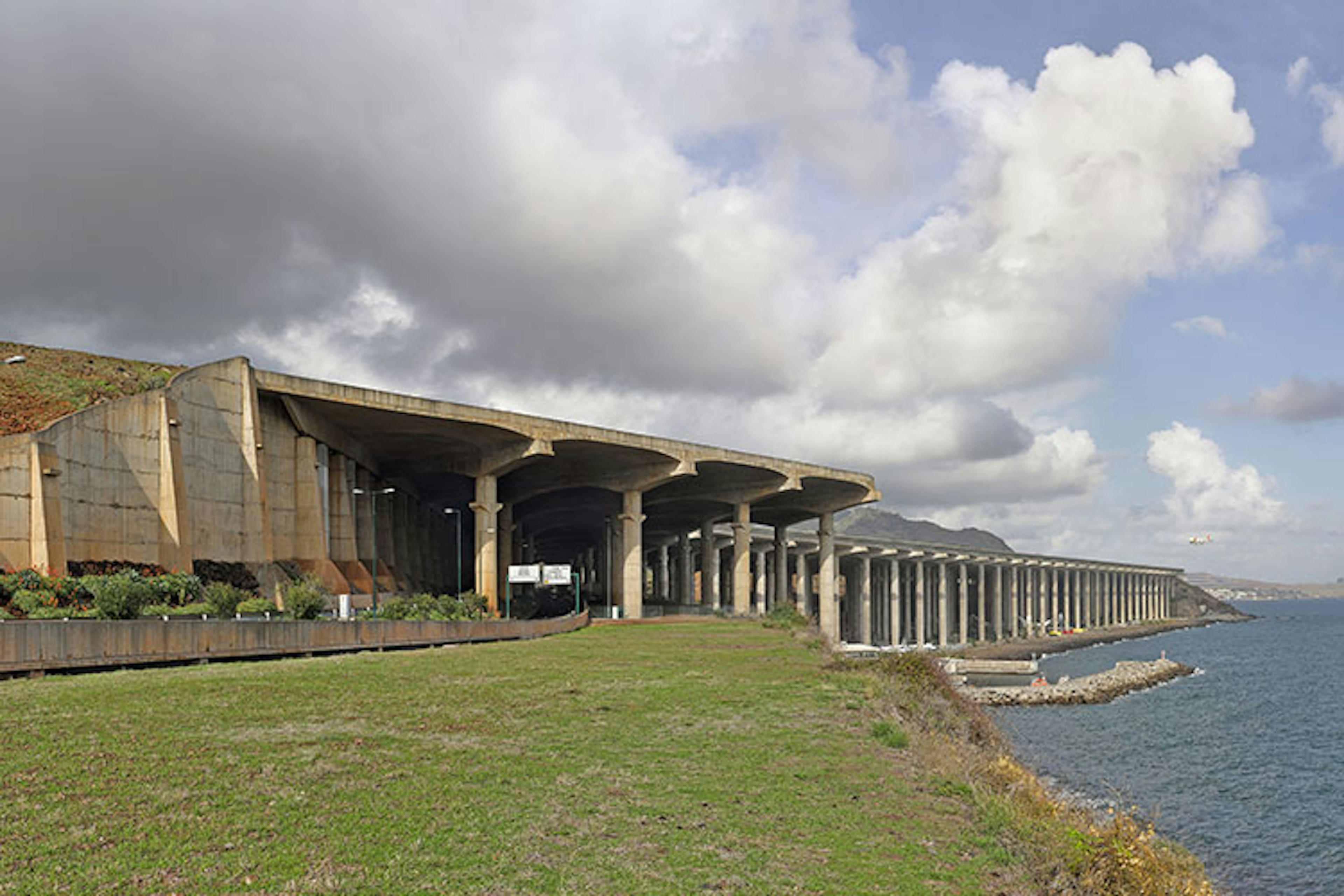 The runway of Madeira Airport extends over the ocean, but relax - it's a lot longer than it used to be. Image from Wikimedia Commons