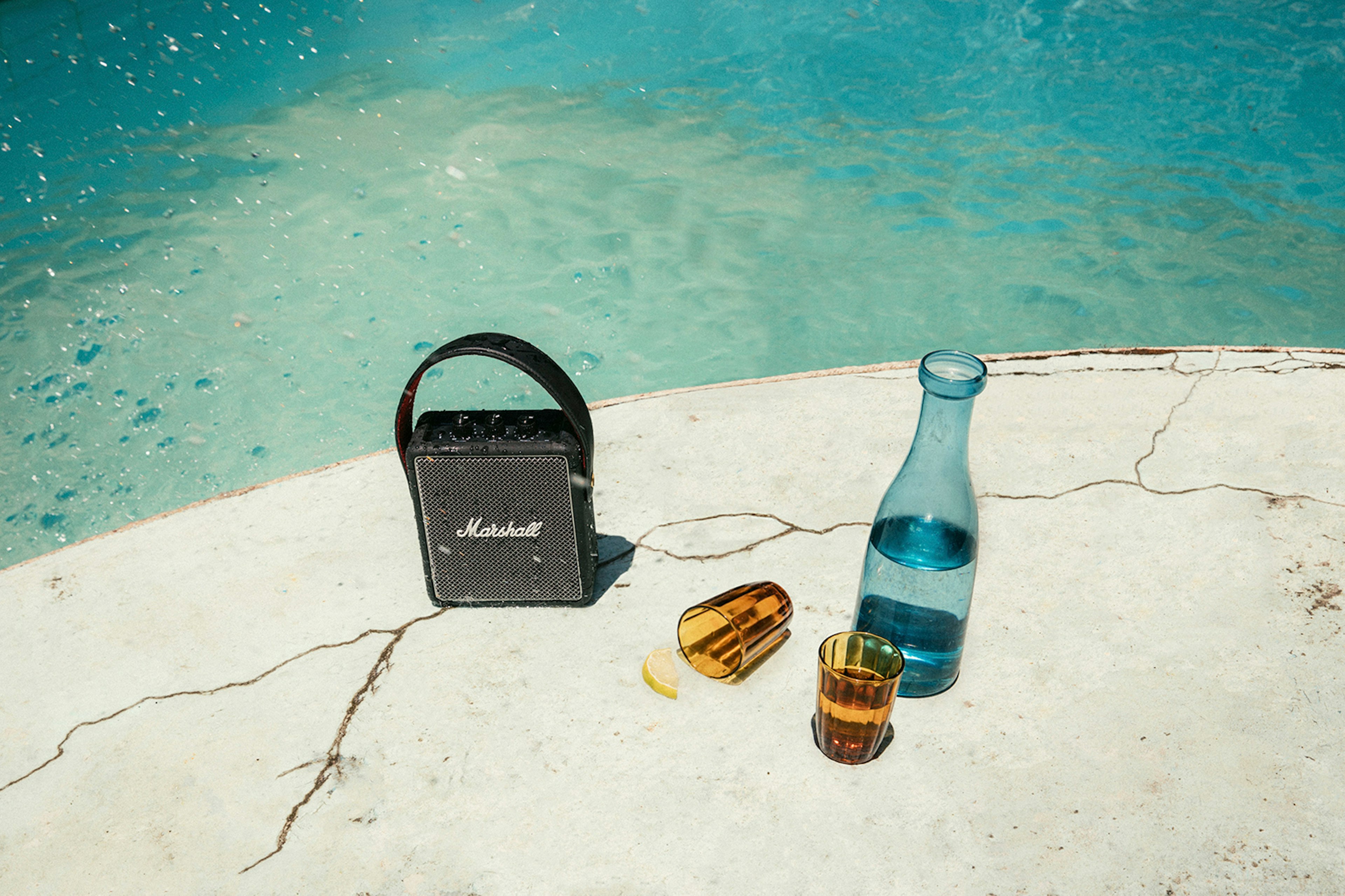 Stockwell II speaker next to a pool