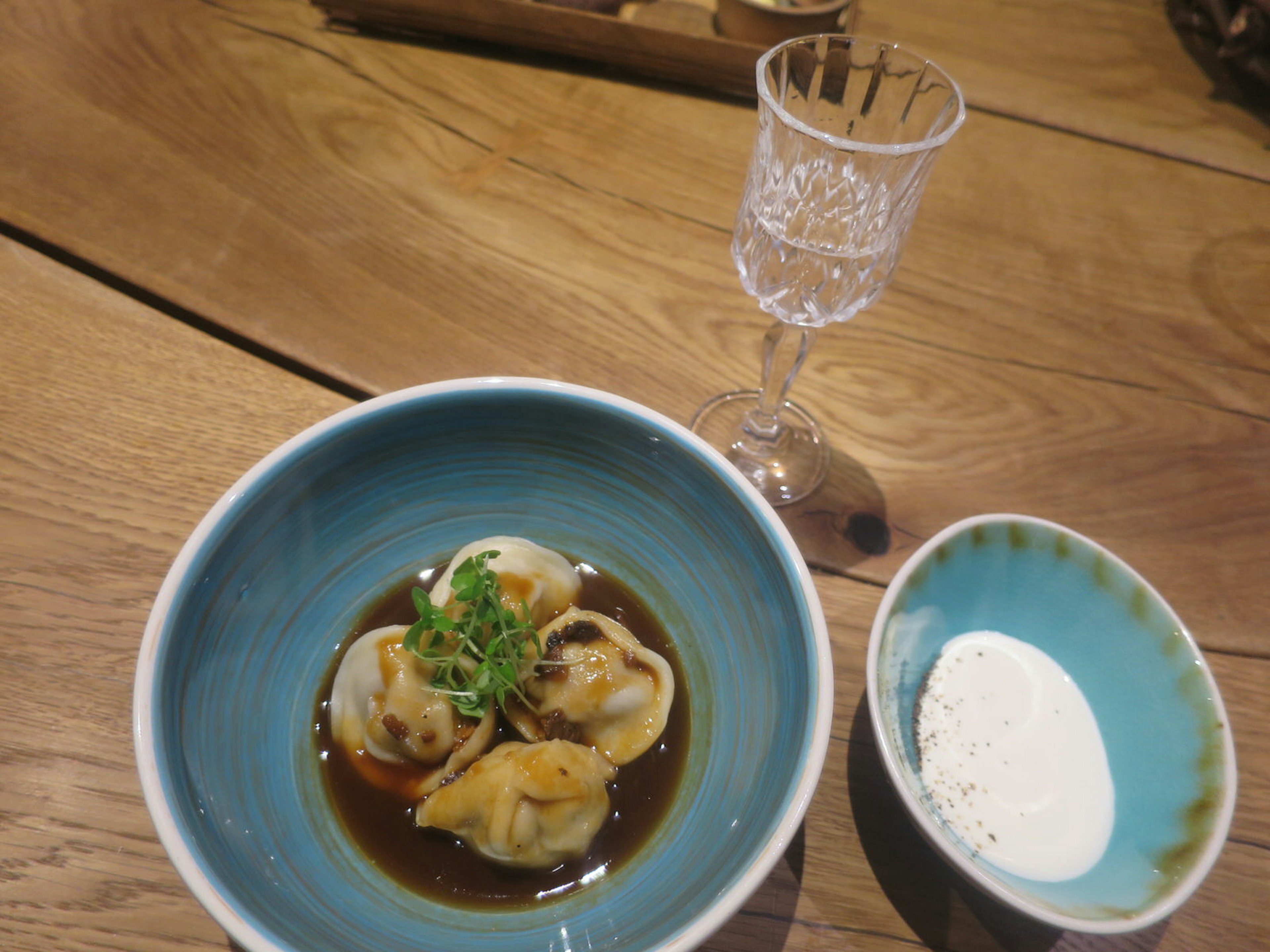 Handmade dumplings filled with elk, Siberian beef and lamb in a porcini stock at Tallinn's Restaurant Moon © Karyn Noble / iBestTravel