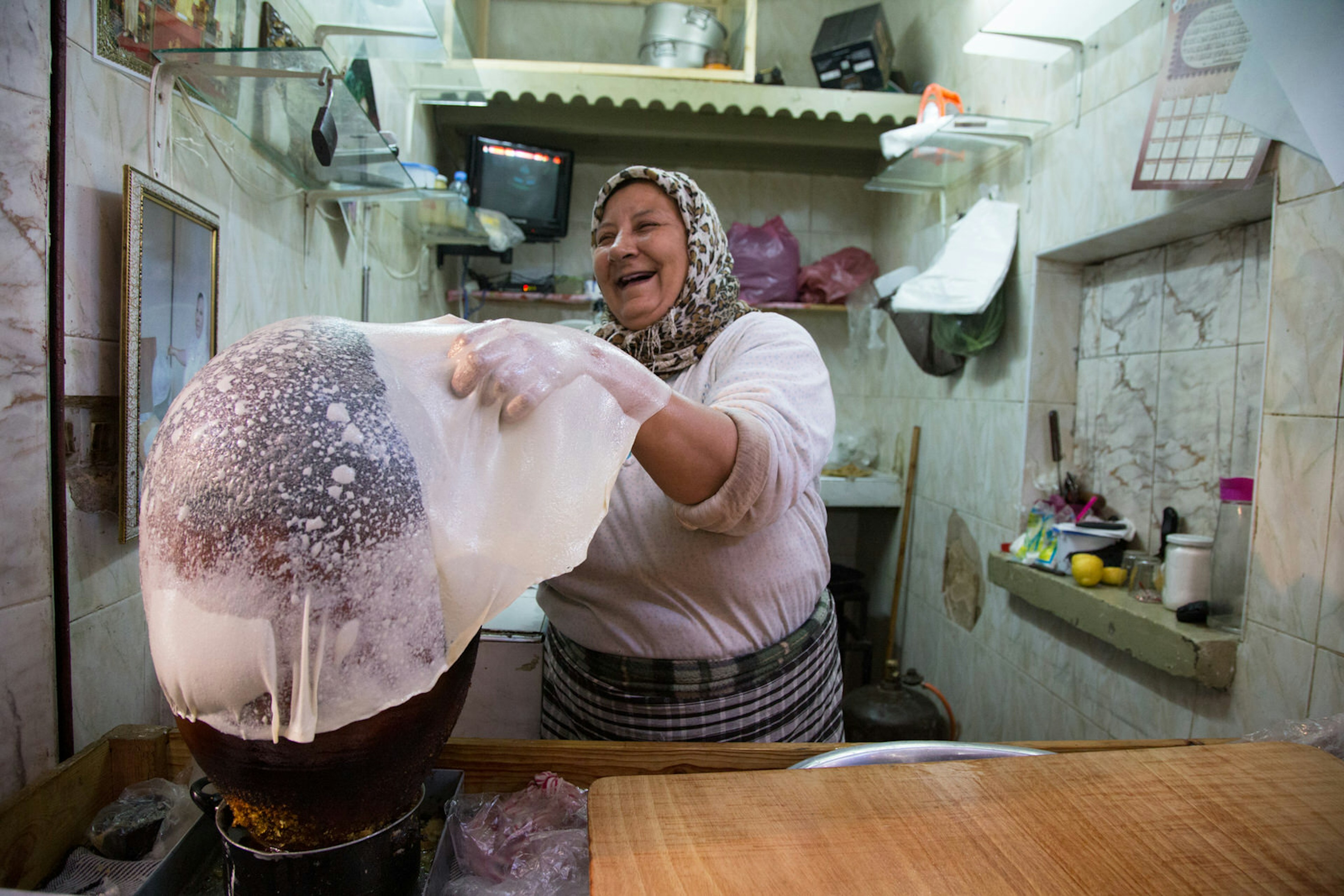 Woman making trid, Moroccan bread, in Fez. Image by Plan-it Morocco