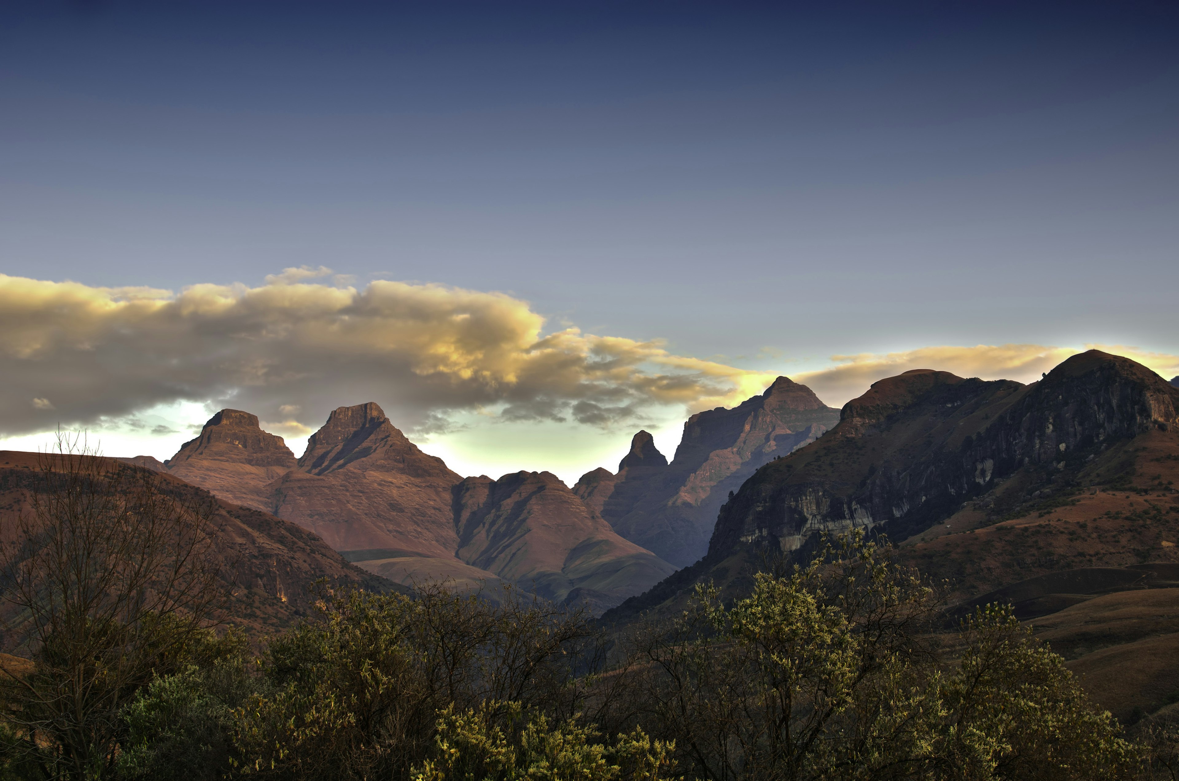 "Sunrise over Cathedral peak in the Drakensberg, Kwazulu-Natal, South Africa. This is an HDR image."
175506754
"Wilderness Area, Africa, Backgrounds, Beauty In Nature, Blue, Cloud, Cloudscape, Day, Drakensberg, Environment, Extreme Terrain, Green, Hdr", High Up, Hiking, Horizontal, Idyllic, Kwazulu-Natal, Landscape, Majestic, Mountain, Mountain Peak, Nature, Nobody, Outdoors, Plant, Rock, Scenics, Sky, South Africa, Southern Africa, Sunlight, Sunrise, Sunset, Yellow