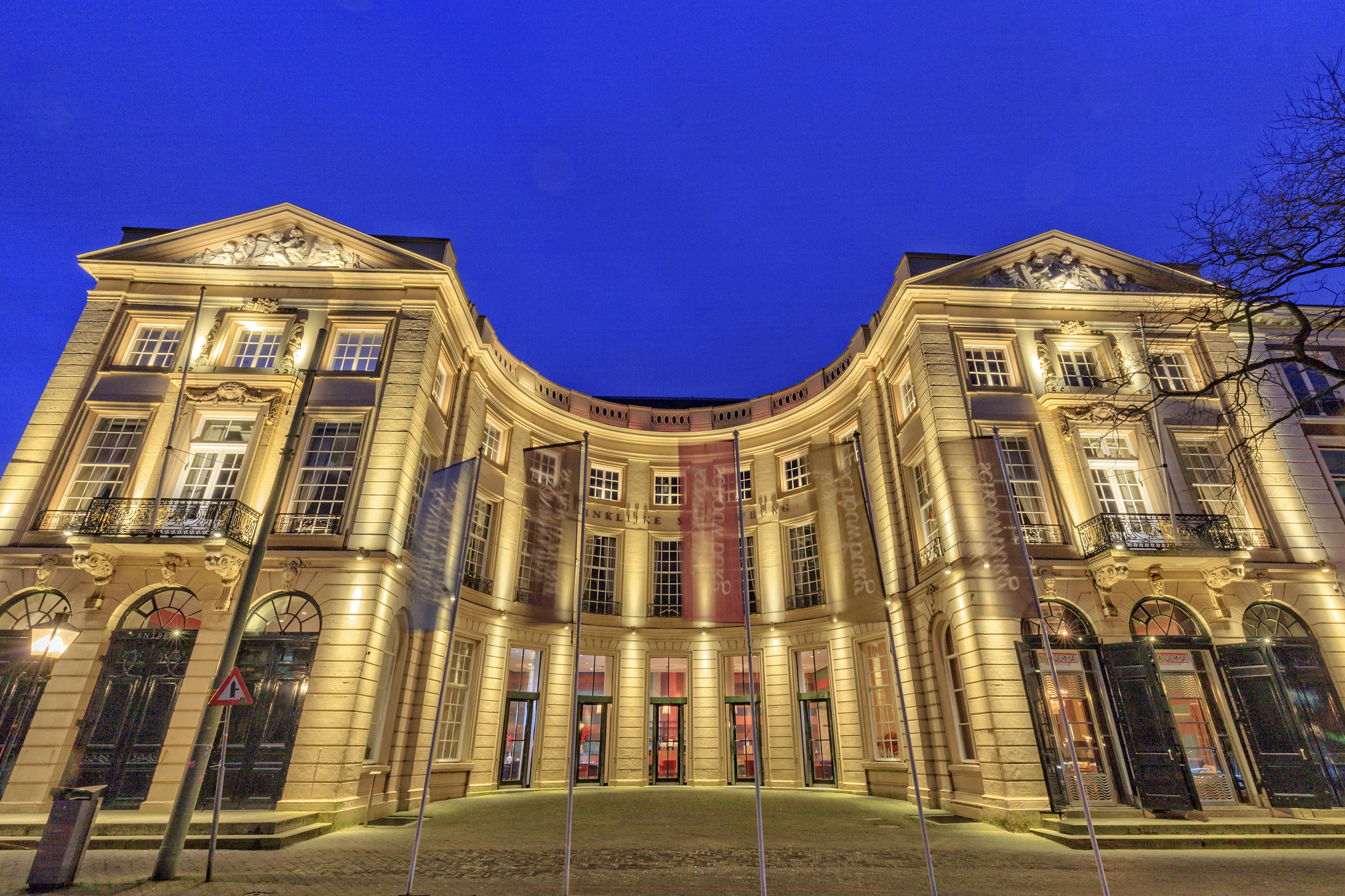 The Hague, Netherlands - January 19, 2016: The Hague, Netherlands - September 19, 2012: illuminated facade of the Royal Theatre, in Dutch called Koninklijke Schouwburg, at Korte Voorhout in The Hague. The theatre opened in 1804 in a city palace dating from 1766. Following a huge renovation project from 1997 to 1999 a modern theatre emerged. Despite the alterations the theatre was able to preserve its original 19th century character. The theatre presents exceptional international productions which are outside the scope of its regular programme.
508033176
Building Exterior, South Holland, Facade, Dusk, Illuminated, Famous Place, Outdoors, The Hague, Netherlands, Night, Window, Concert Hall, Stage Theater