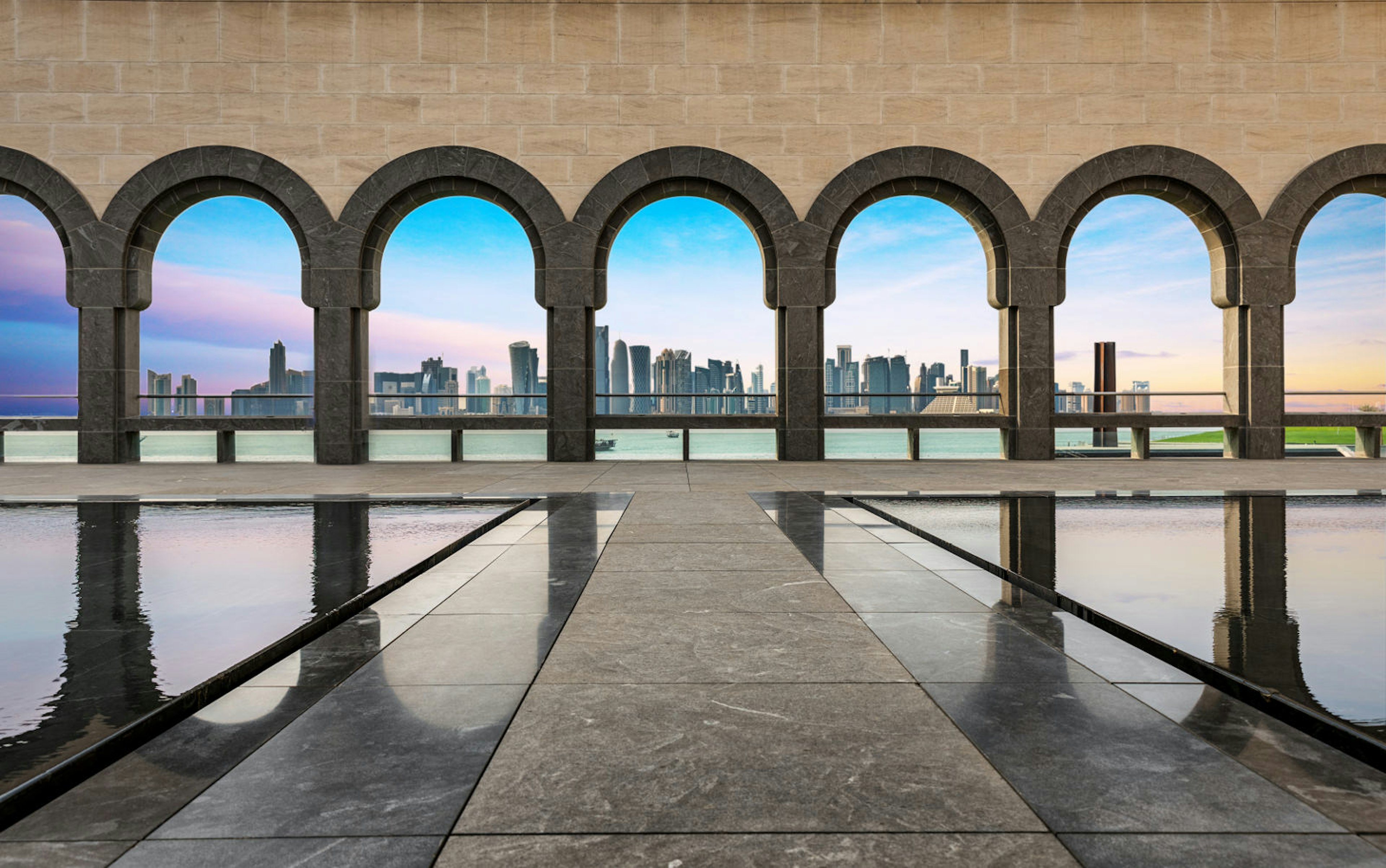 View from the Museum of Islamic Art towards the Skyline of Doha during sunset © Sven Hansche / Shutterstock