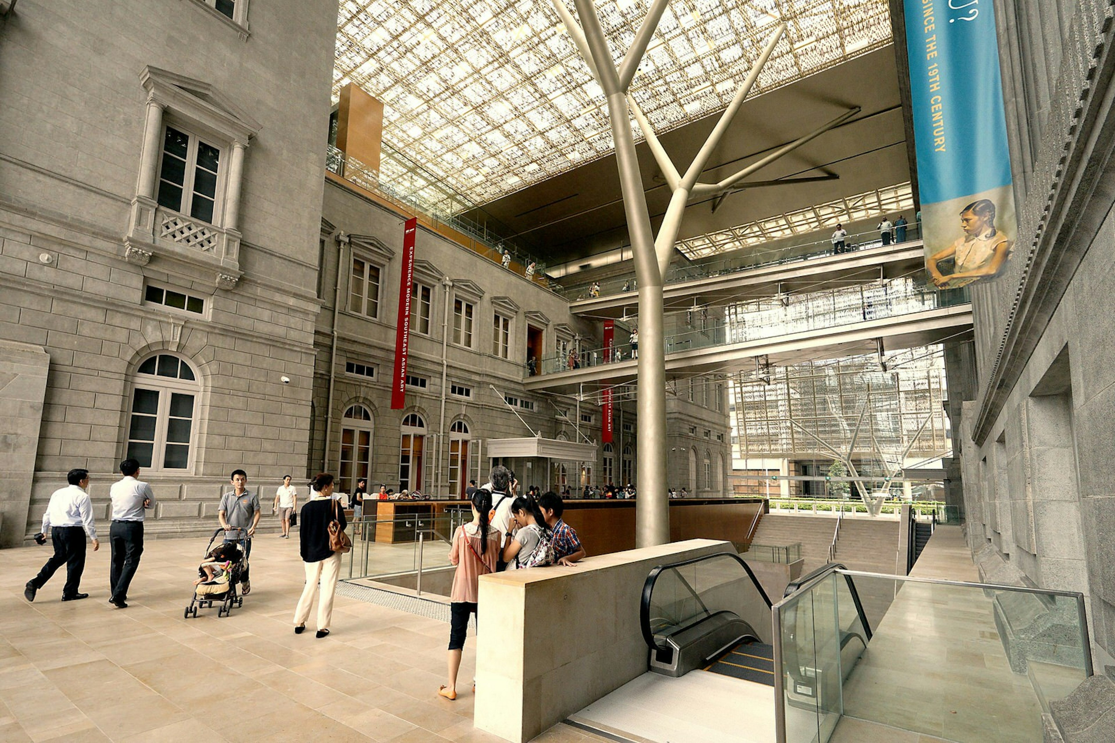 People wander in the Padang Atrium of the National Gallery Singapore © Jenny Zhang / Shutterstock