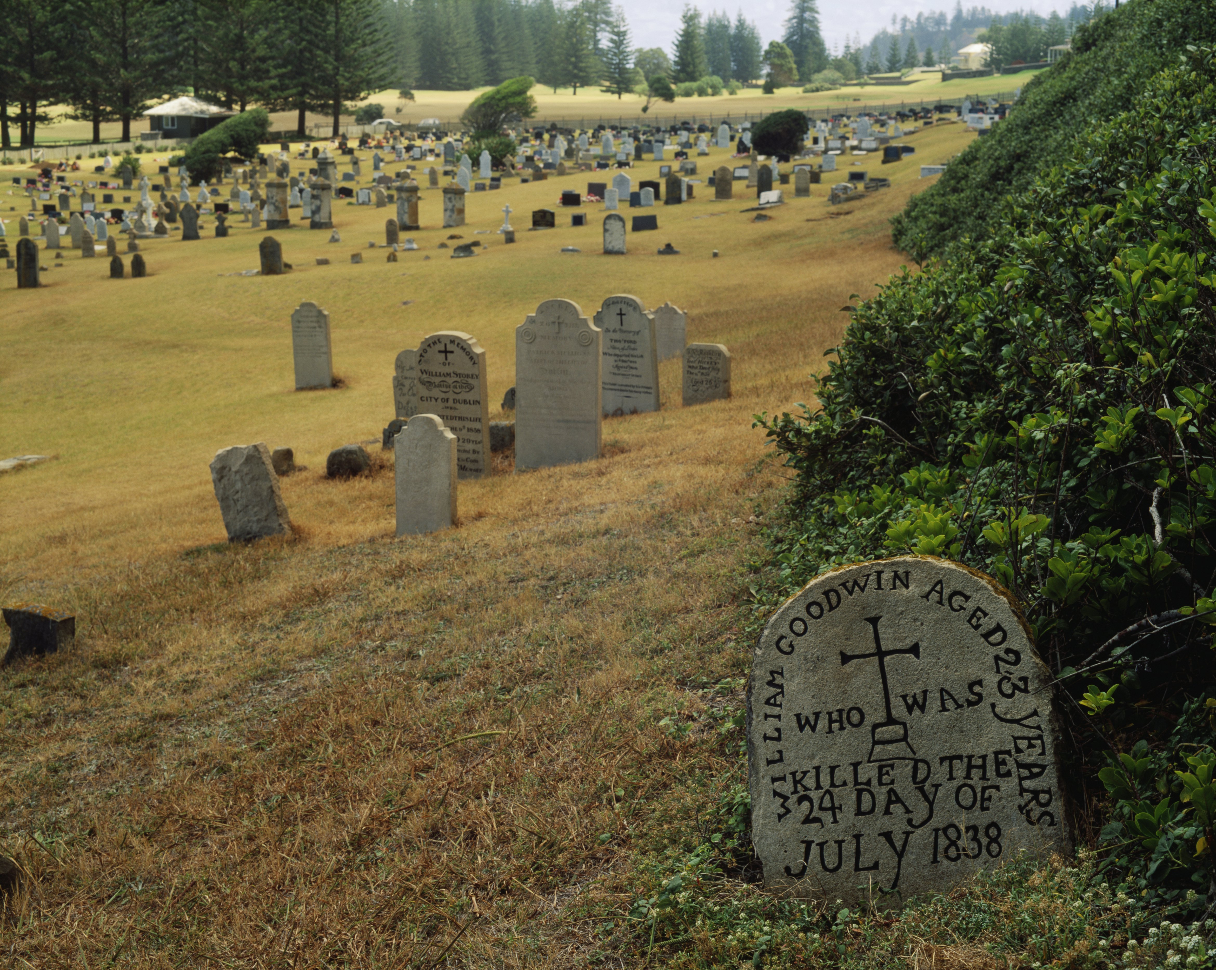 A cemetery in the former penal colony on Norfolk Island shows carved headstones from the 1800s