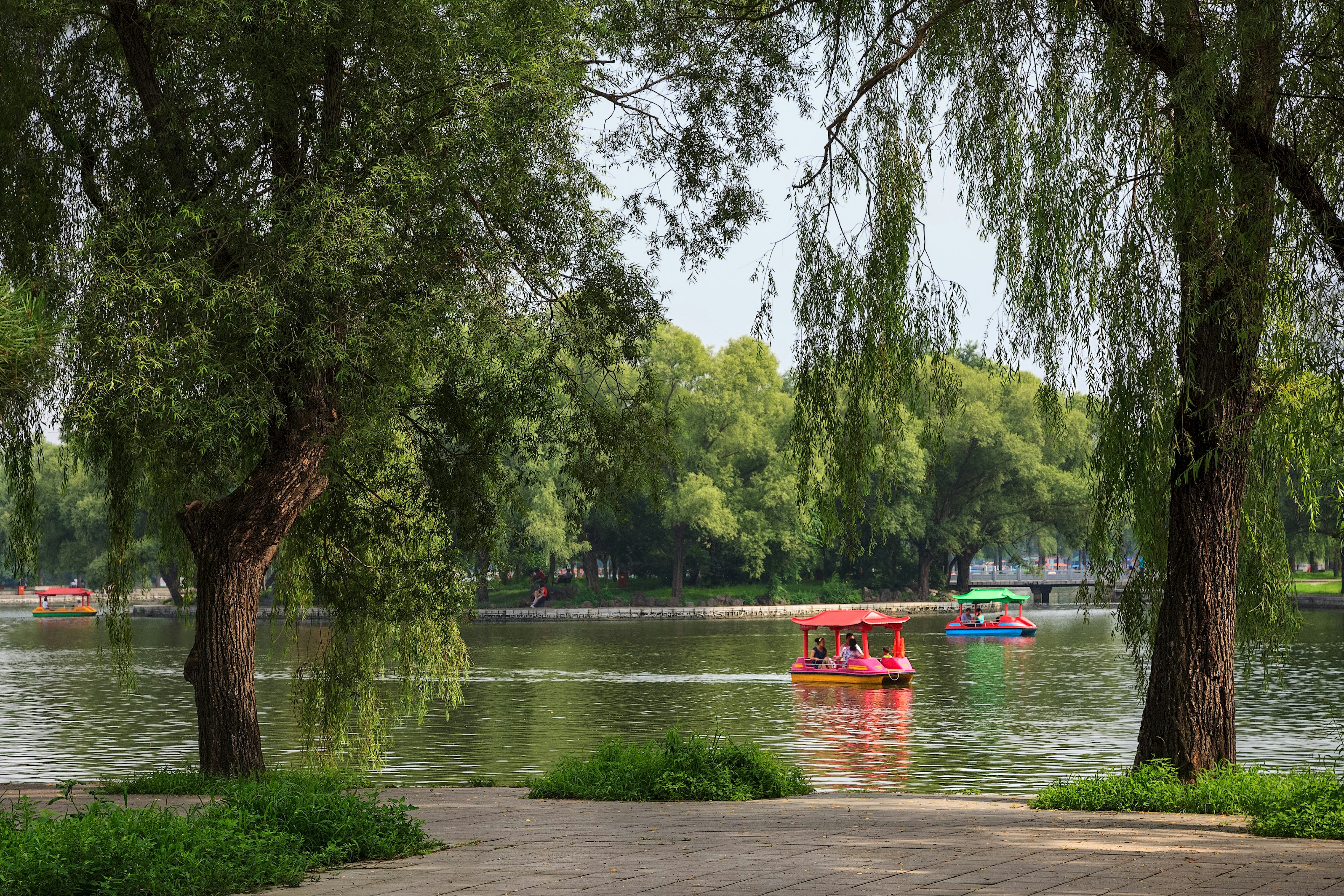 Shenyang, Liaoning, China - July 20, 2013: People having a good time on a boats in Beiling Park in summer
827847364