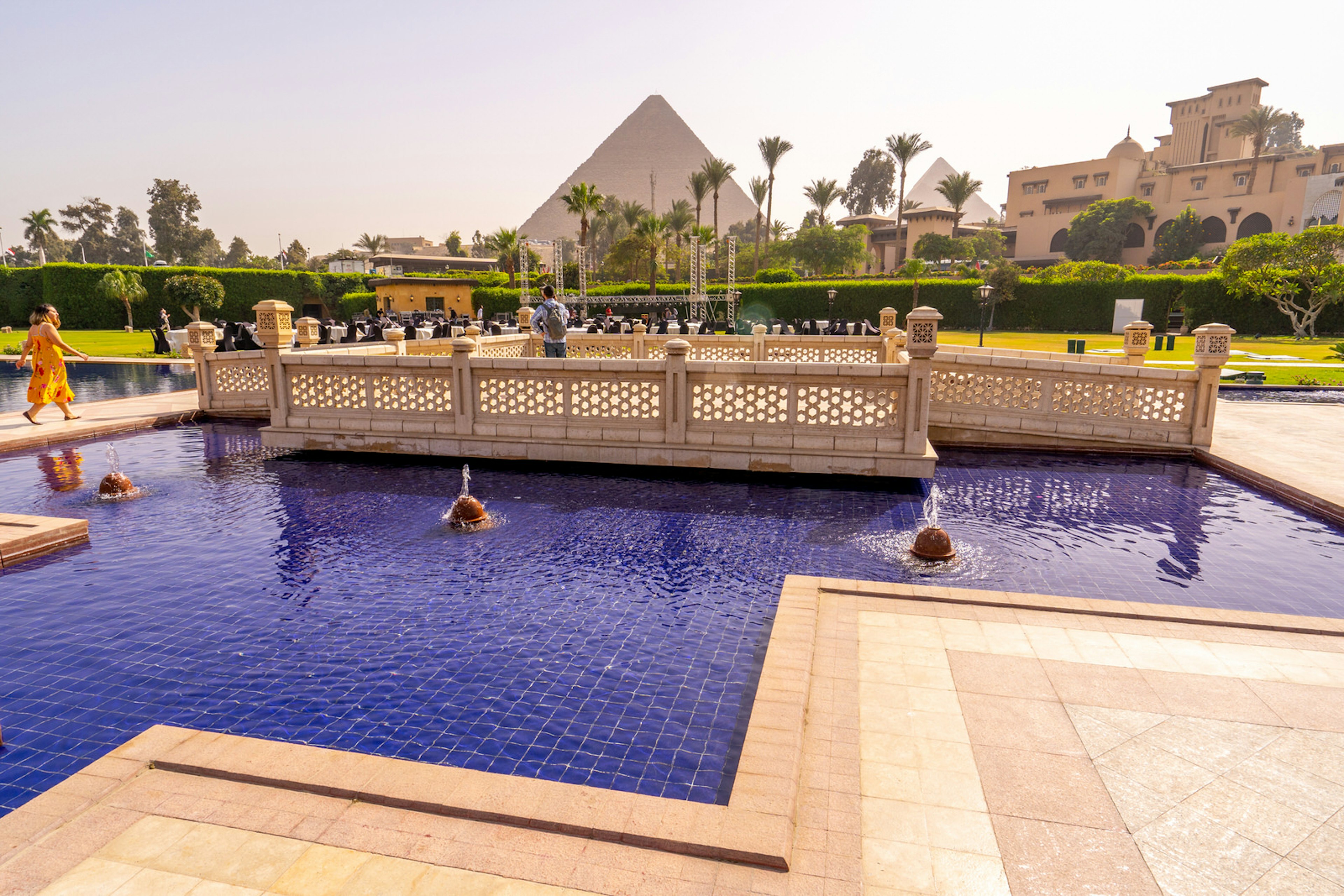 Swimming pool with Cheops pyramid in the background. Pyramids of Giza near Cairo, Egypt