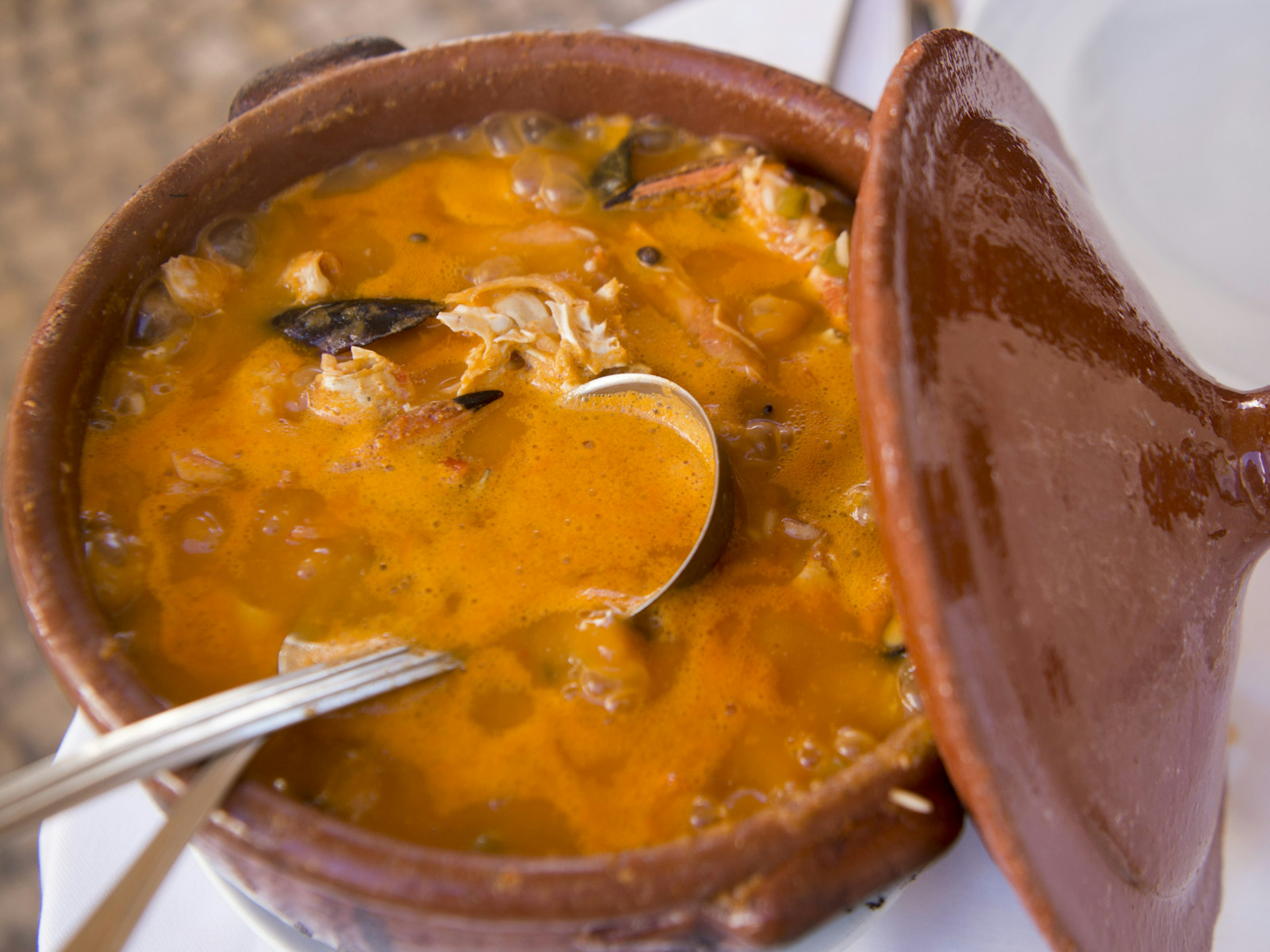 Arroz de marisco in an earthenware pot