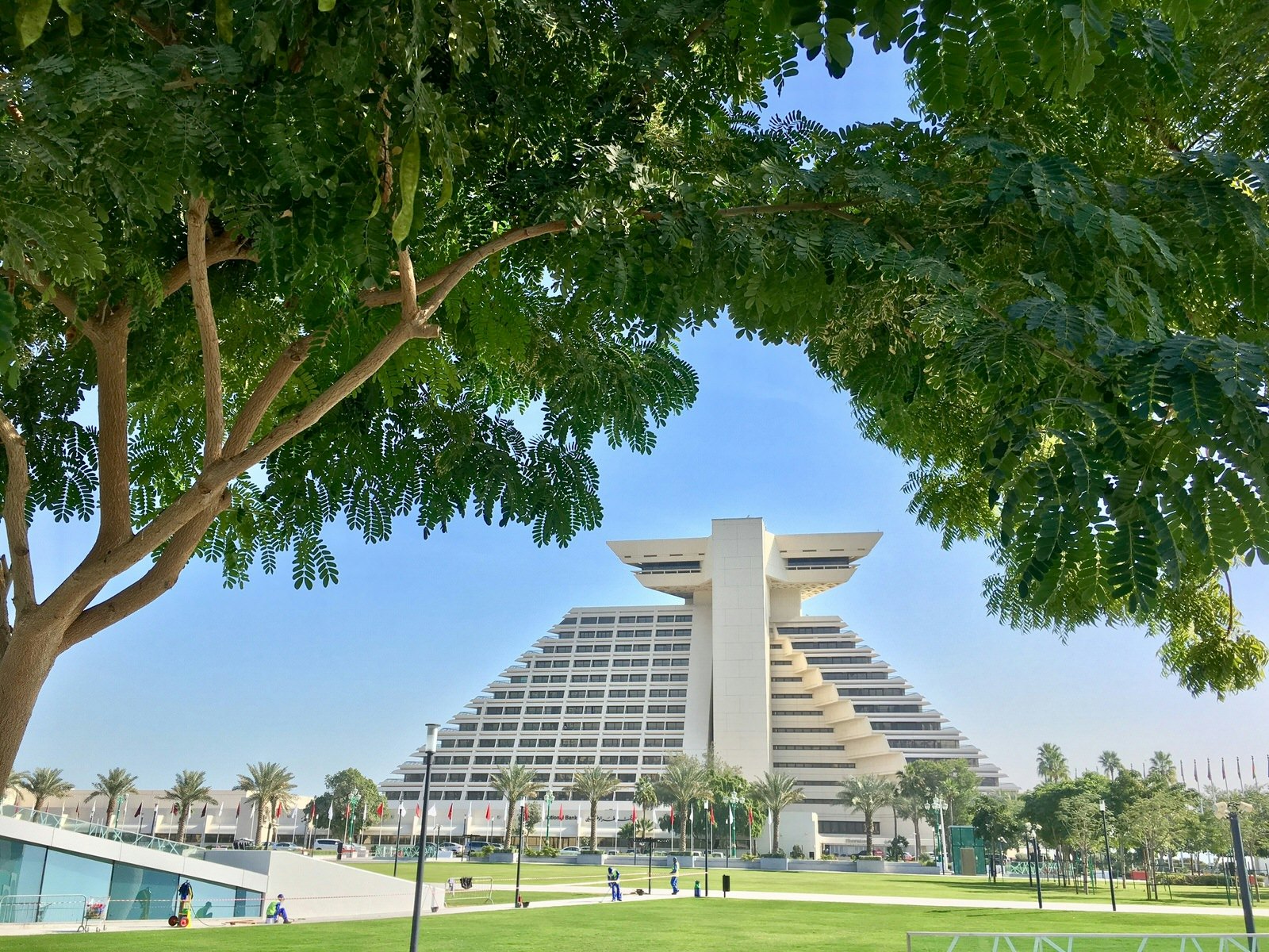 Doha, Qatar - 2nd January 2017: Skyline of Doha, view of famous Sheraton hotel on Corniche of Doha, Qatar; Shutterstock ID 559293628; Your name (First / Last): Lauren Keith; GL account no.: 65050; Netsuite department name: Online Editorial; Full Product or Project name including edition: Doha brunch article