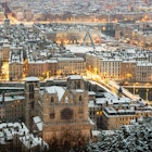 Lyon and the banks of the rhone river under the snow in winter with golden city light and cold cloudy weather. Ambiance of morning, quiet, freezing, snowy, enlighted, christmas, december, january., License Type: media_digital, Download Time: 2024-09-10T19:40:54.000Z, User: tasminwaby56, Editorial: false, purchase_order: 65050, job: Online Editorial, client: Lyon Time to Visit, other: Tasmin Waby