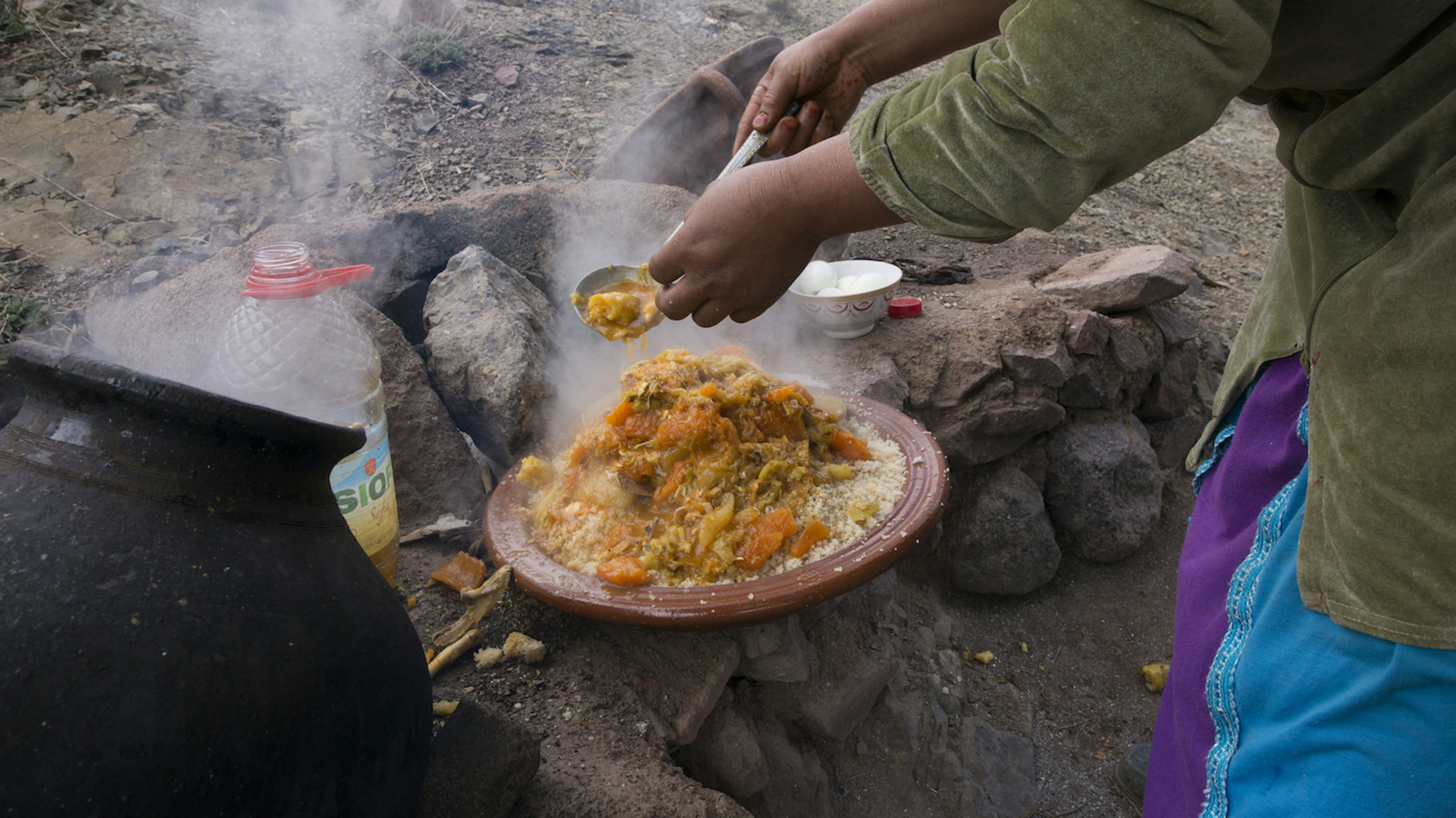 Someone preparing a tangine