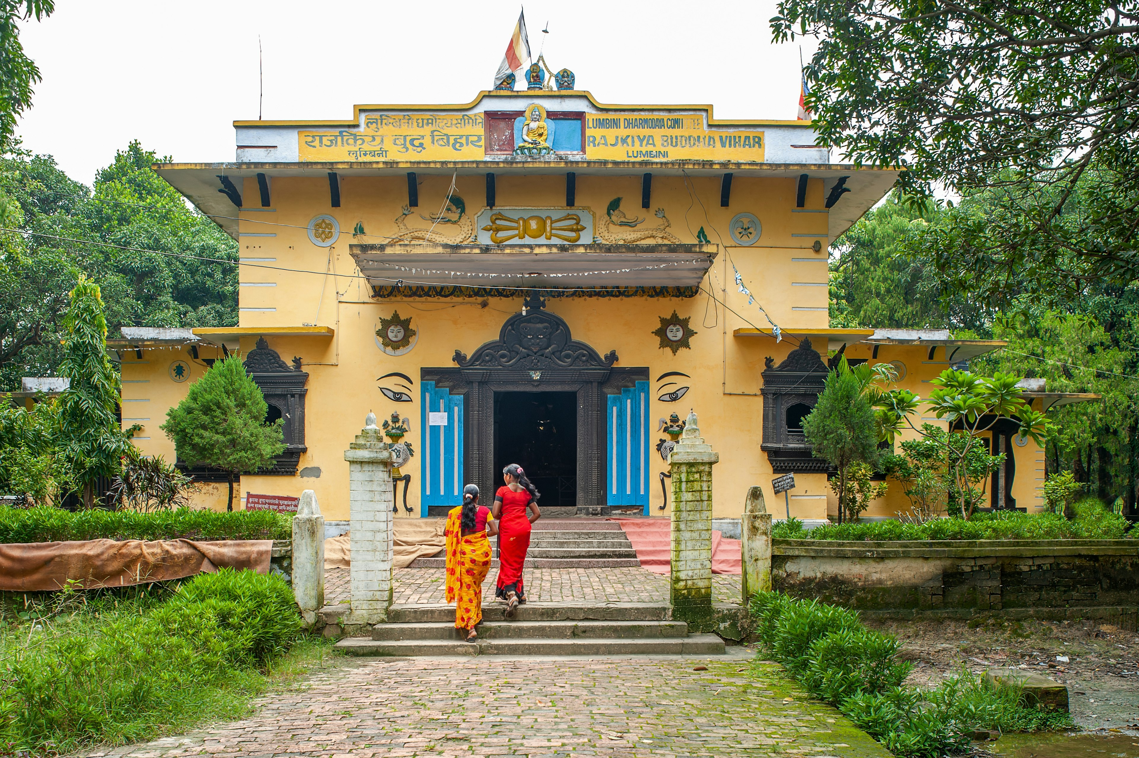 It is considered respectful to wear clothes that cover arms and legs when visiting monasteries. Shutterstock