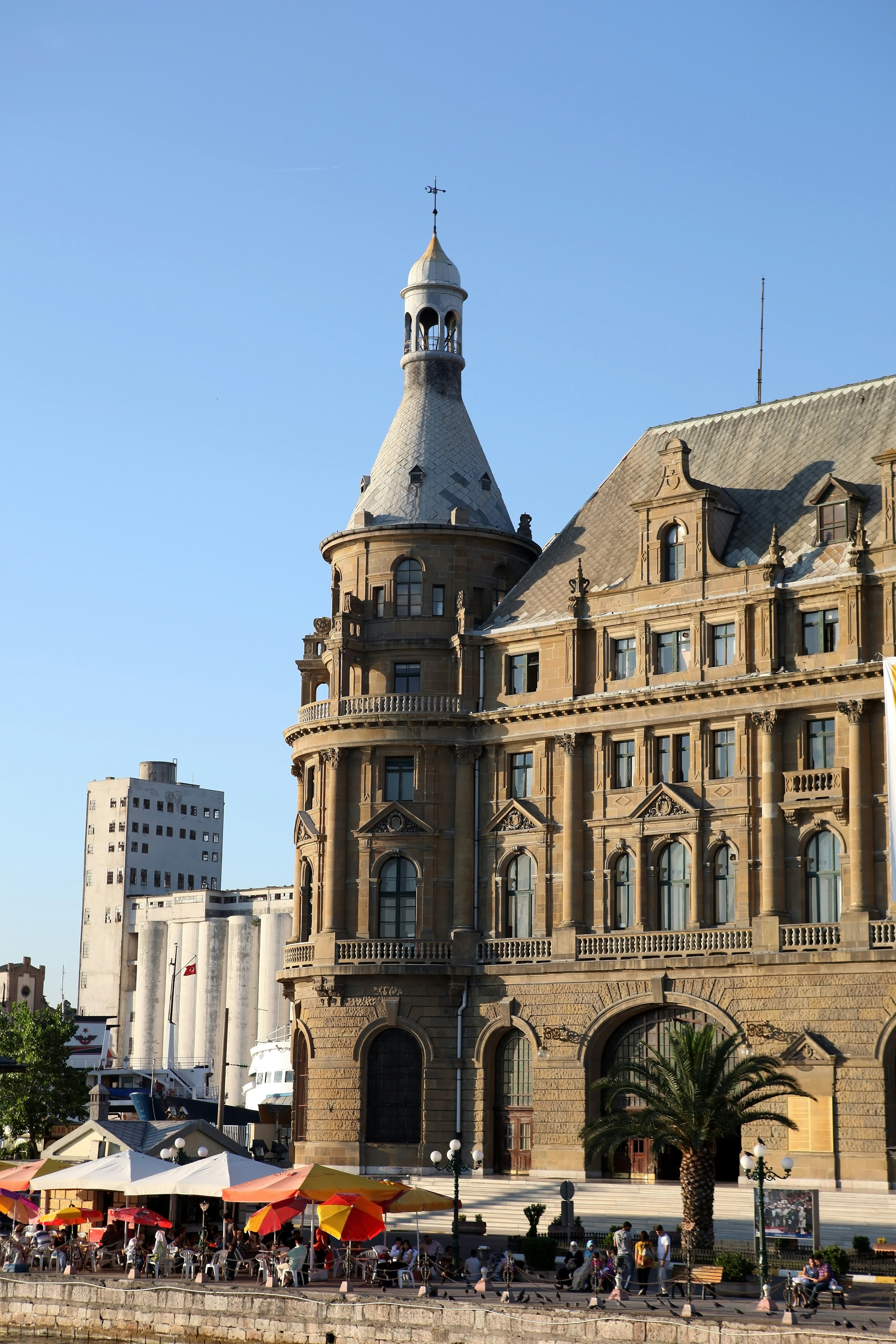 A large stone building with a rounded tower on one corner