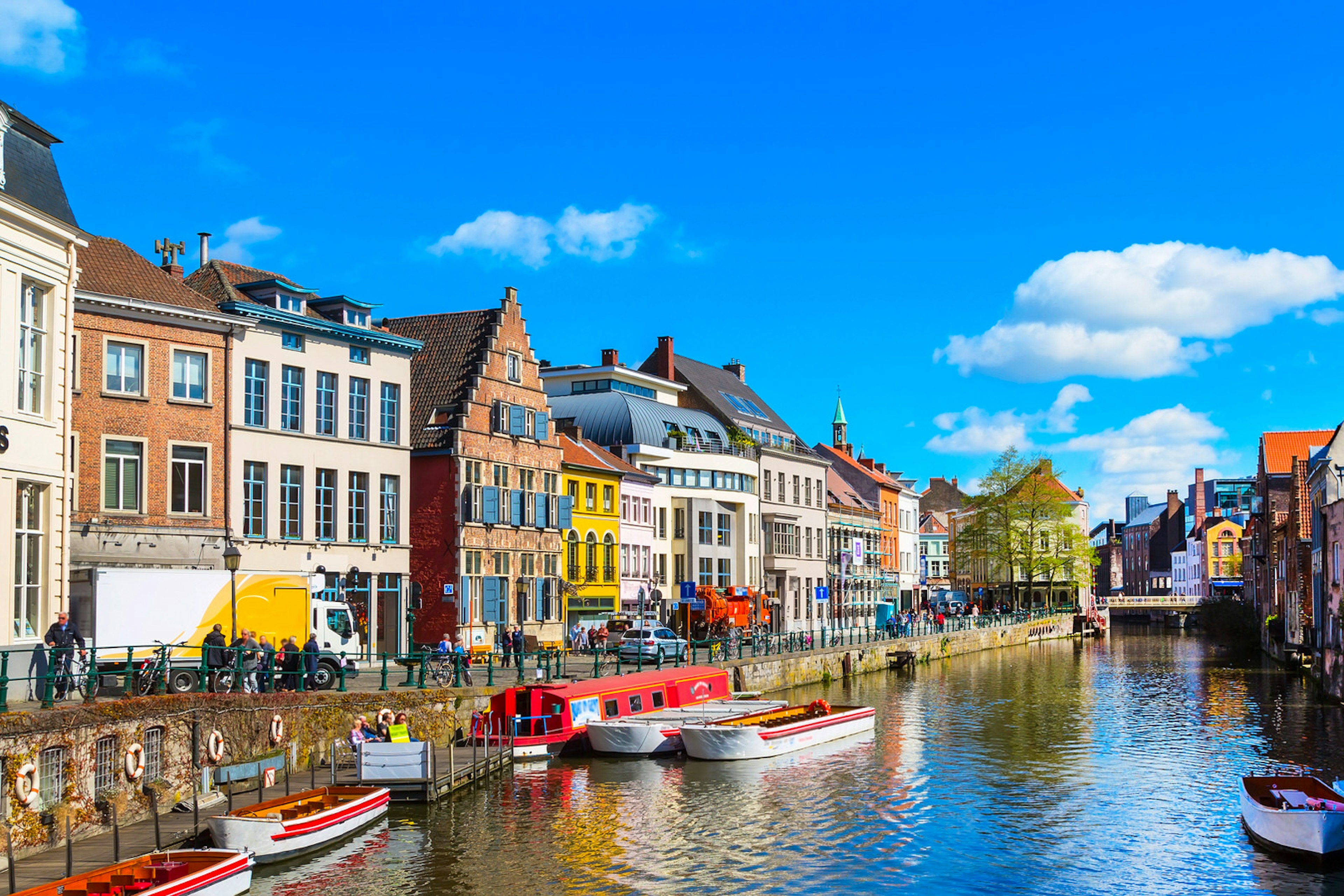 Colourful houses strung along the canal in Ghent, Belgium