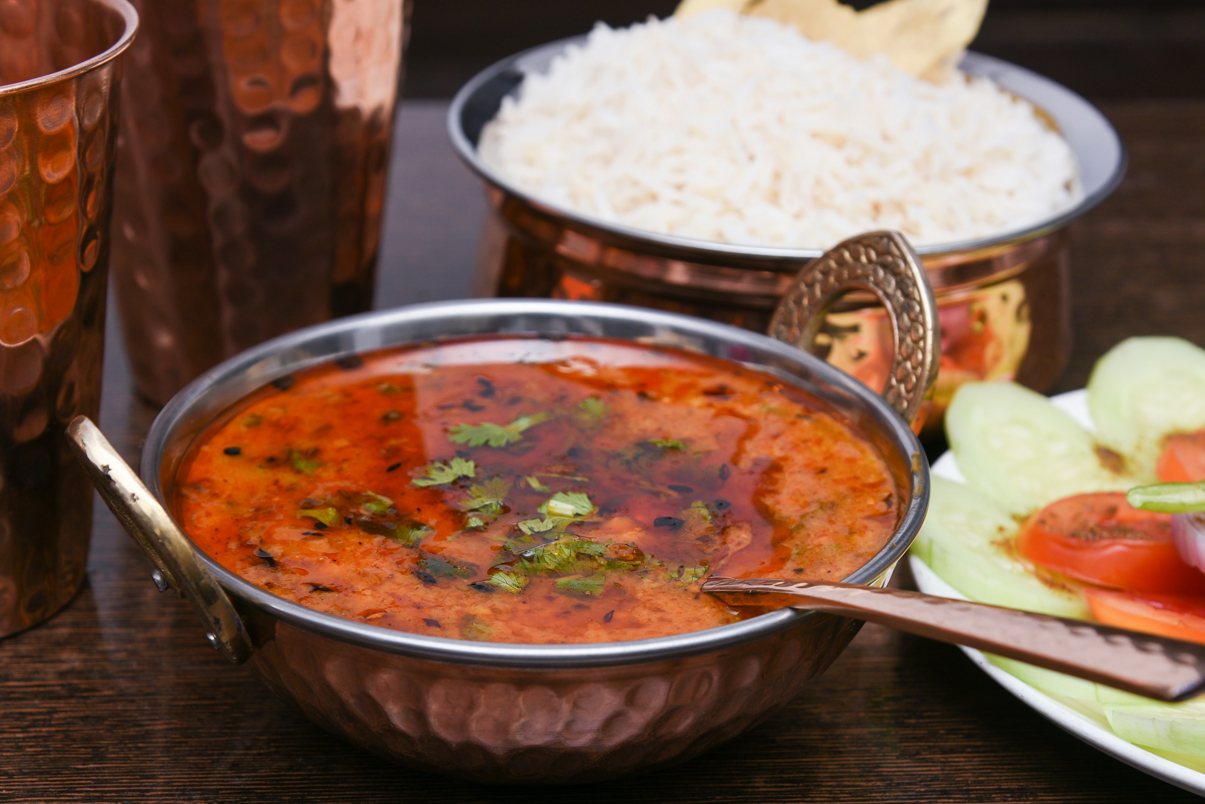 A copper bowl of dhal fry in Rajasthan in India.