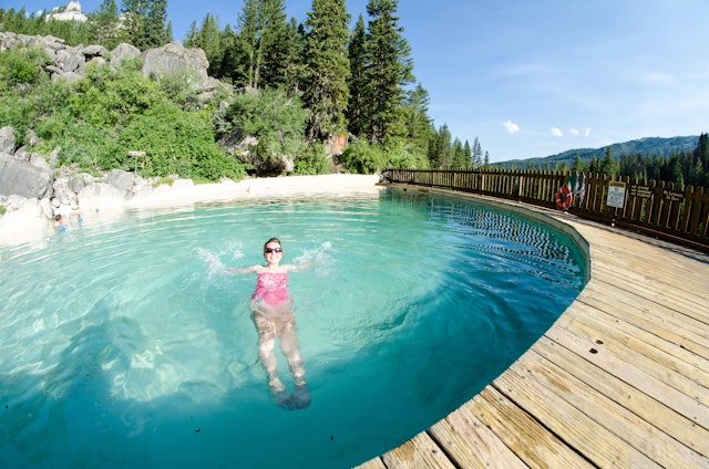 An adult female goes for a swim at Granite Creek Hot Springs, a natural hot spring in Jackson Hole, Wyoming.