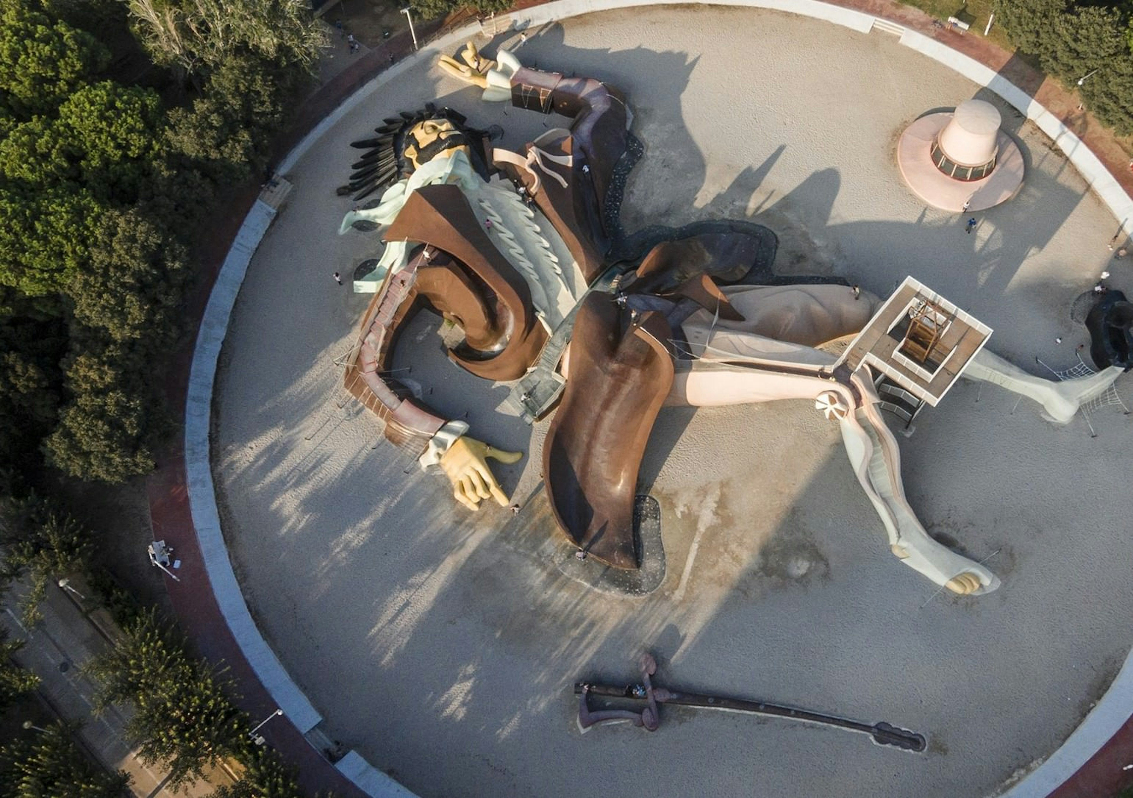 Children climb over the giant Gulliver model in Valencia's Parque Gulliver