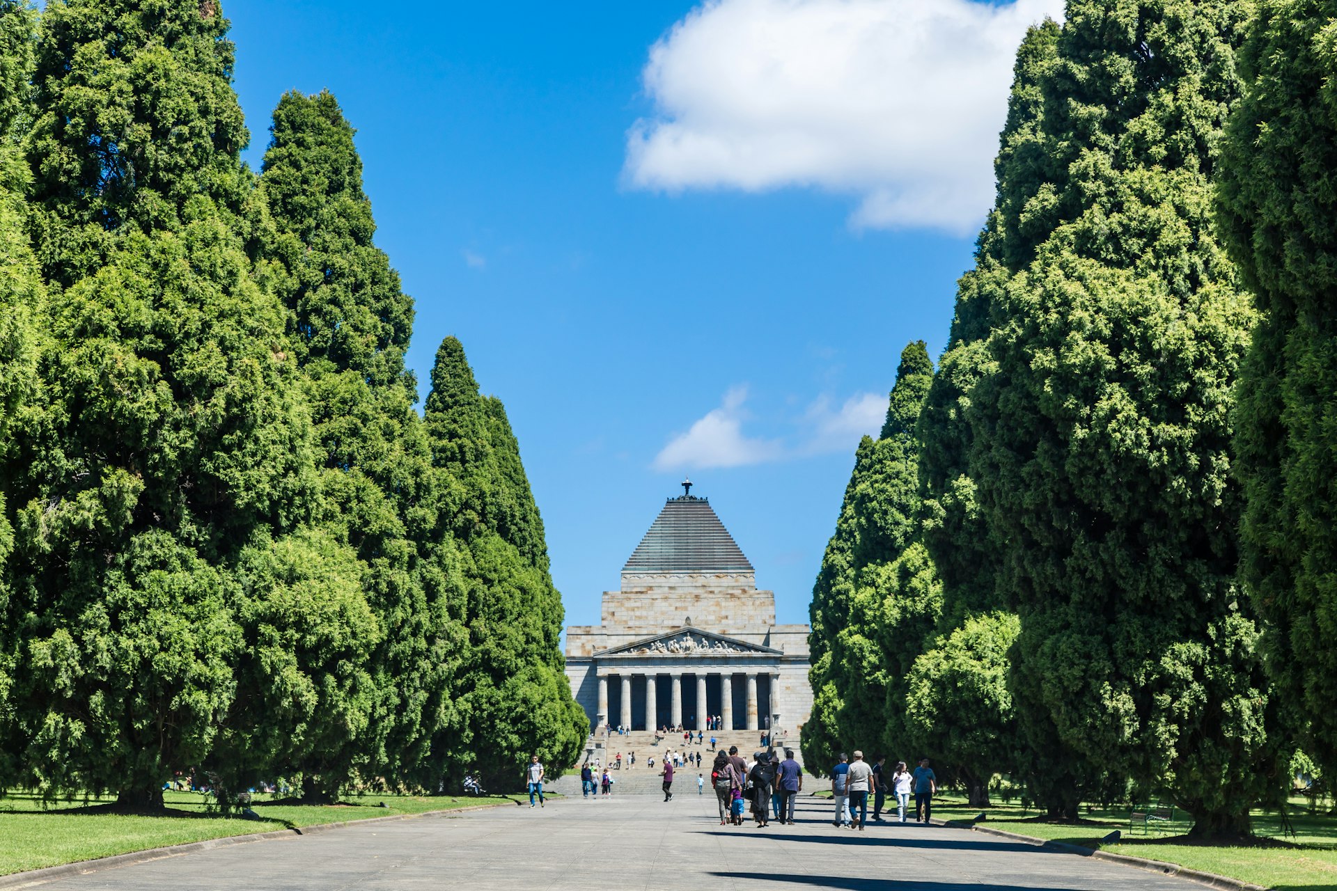 People walking at Melbourne's Shrine of Remembrance, a poignant memorial to all Australians who have served in war. 