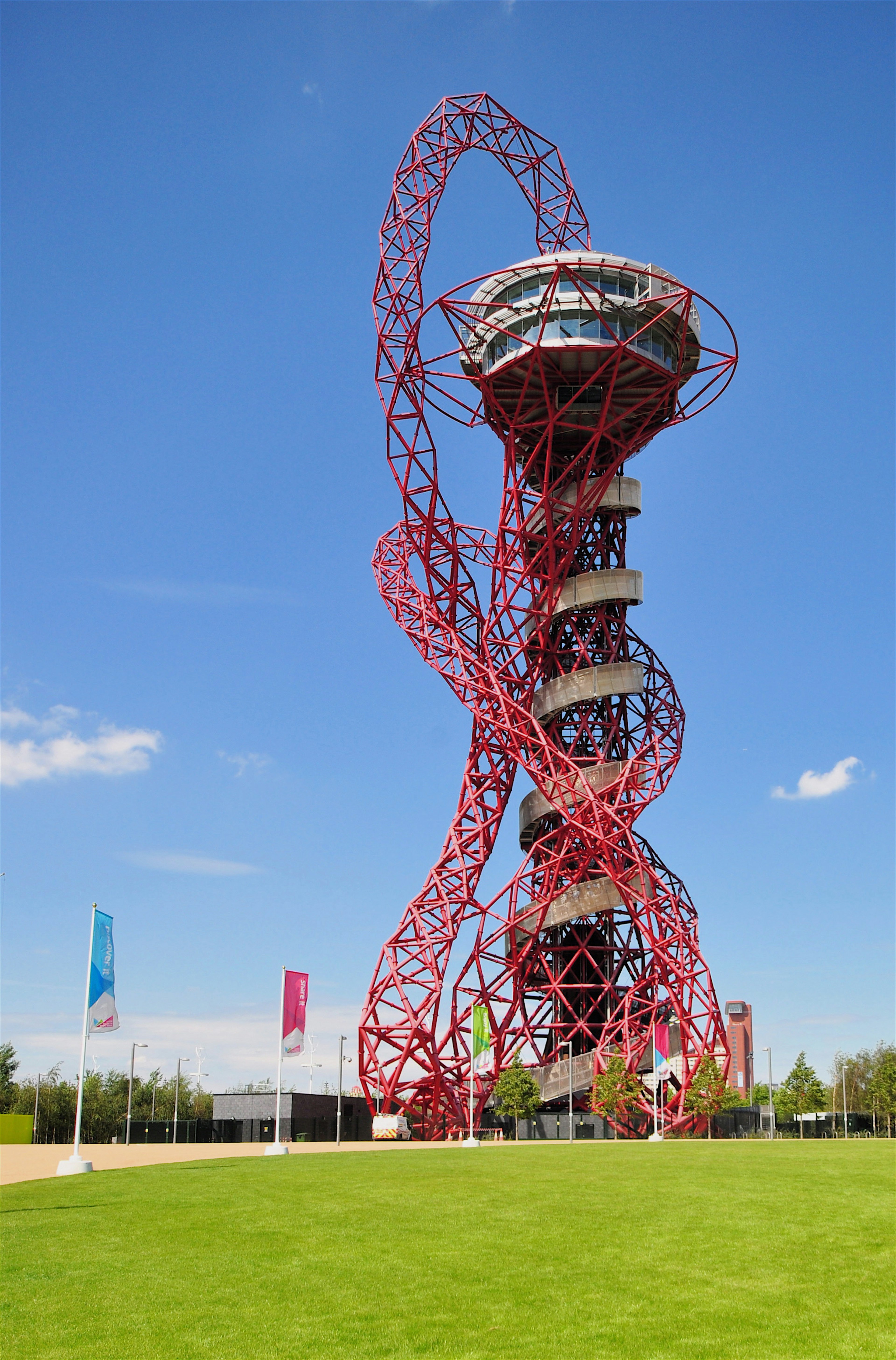 The tall, red ArcelorMittal Orbit is in the Queen Elizabeth Olympic Park