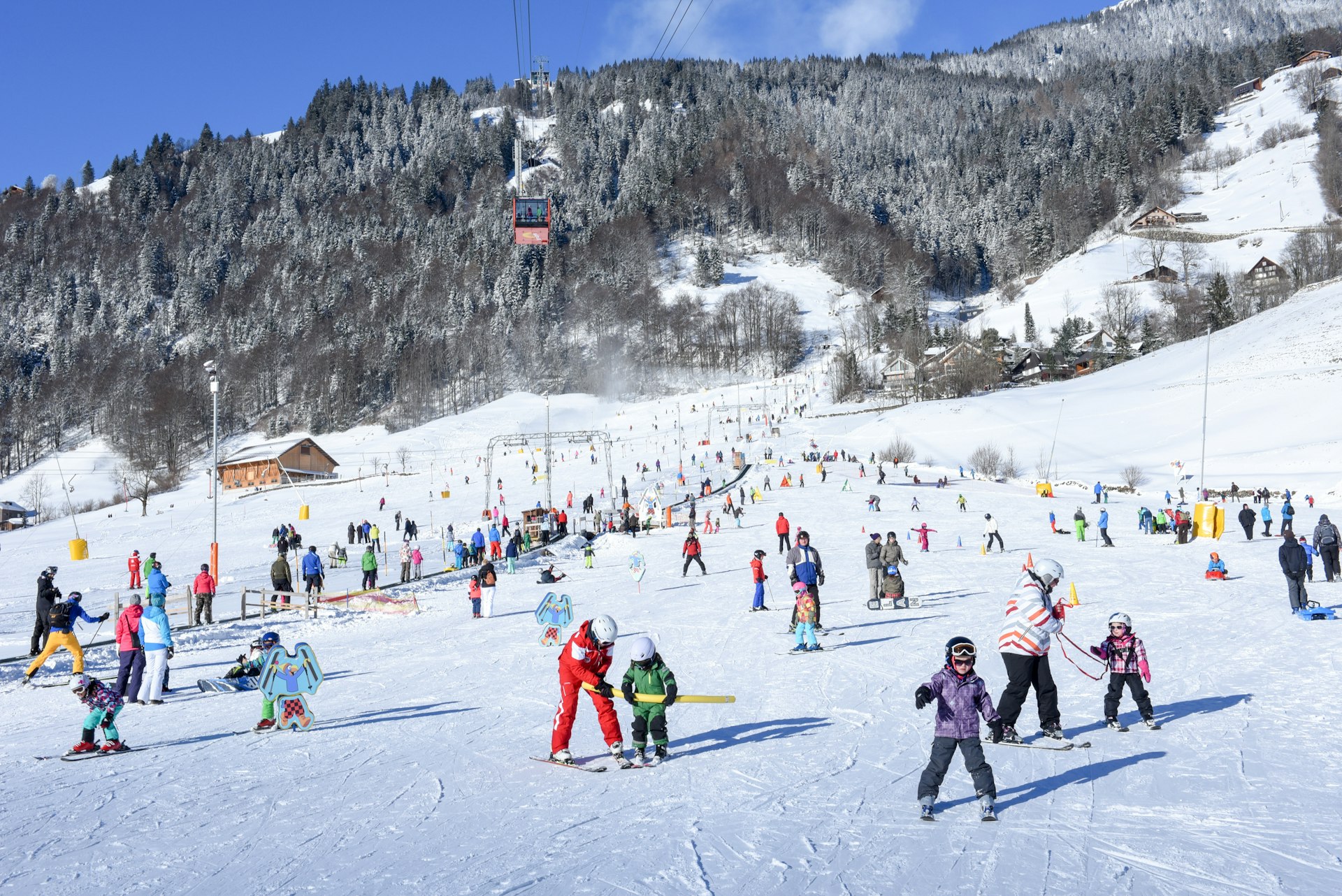 A crowded ski slopes at a beginners run in Engelberg.