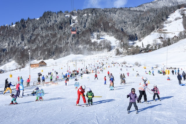 A crowded ski slopes at a beginners run in Engelberg.