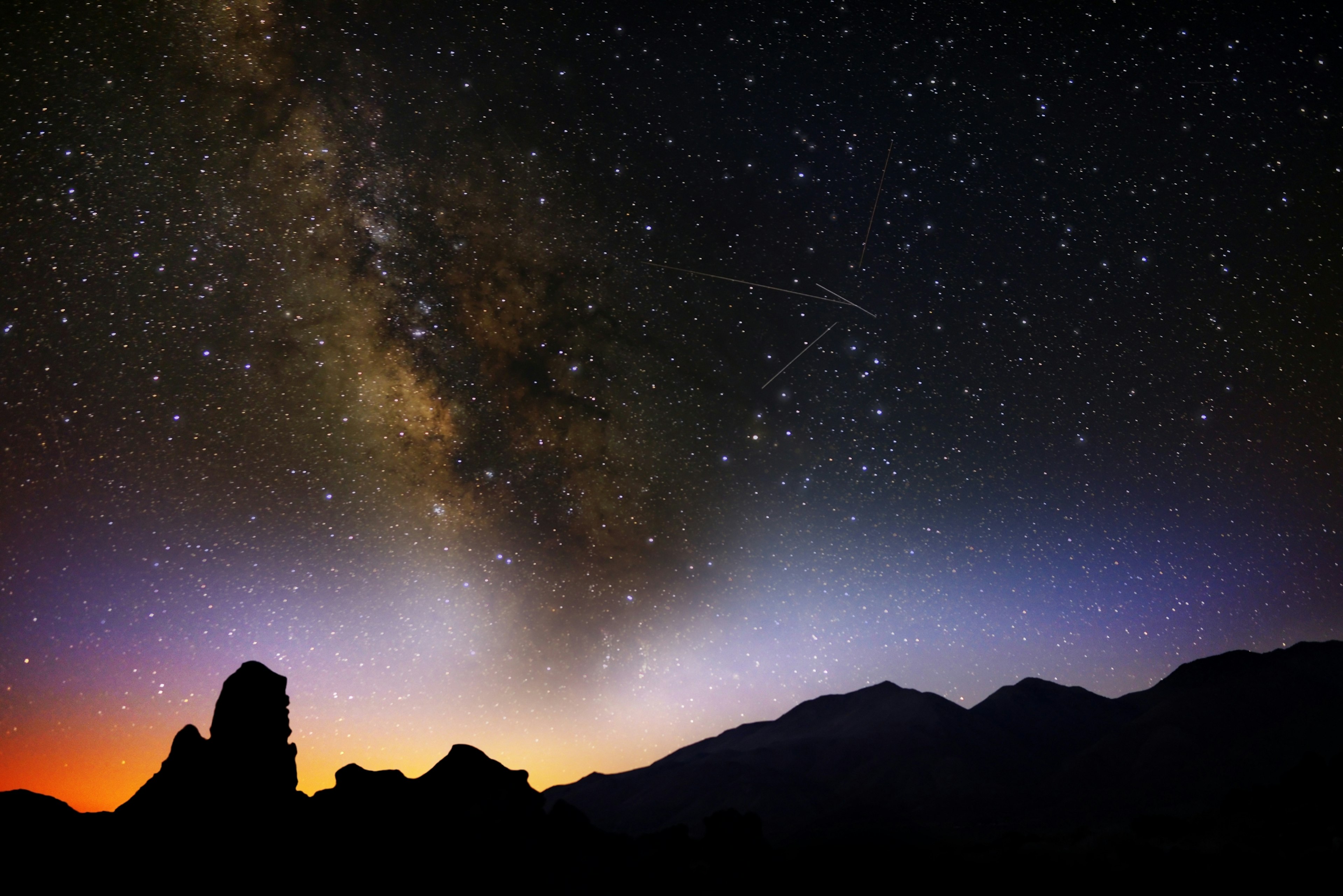 A view of constellations in the night sky over the Sierra Nevada, California