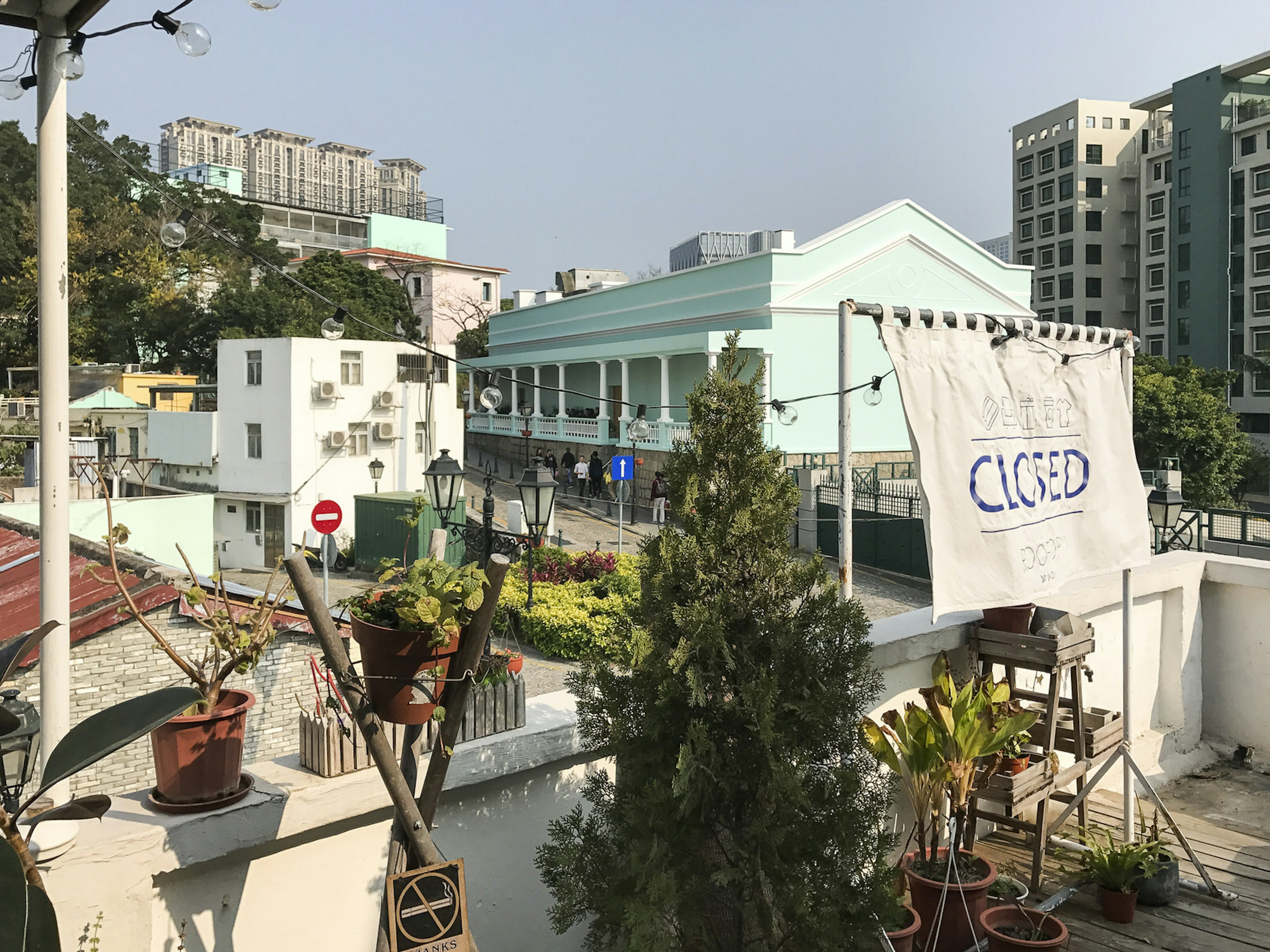 View of a roof garden and old Taipa village. Rooptop Macau is one of Taipa's hip outdoor spaces