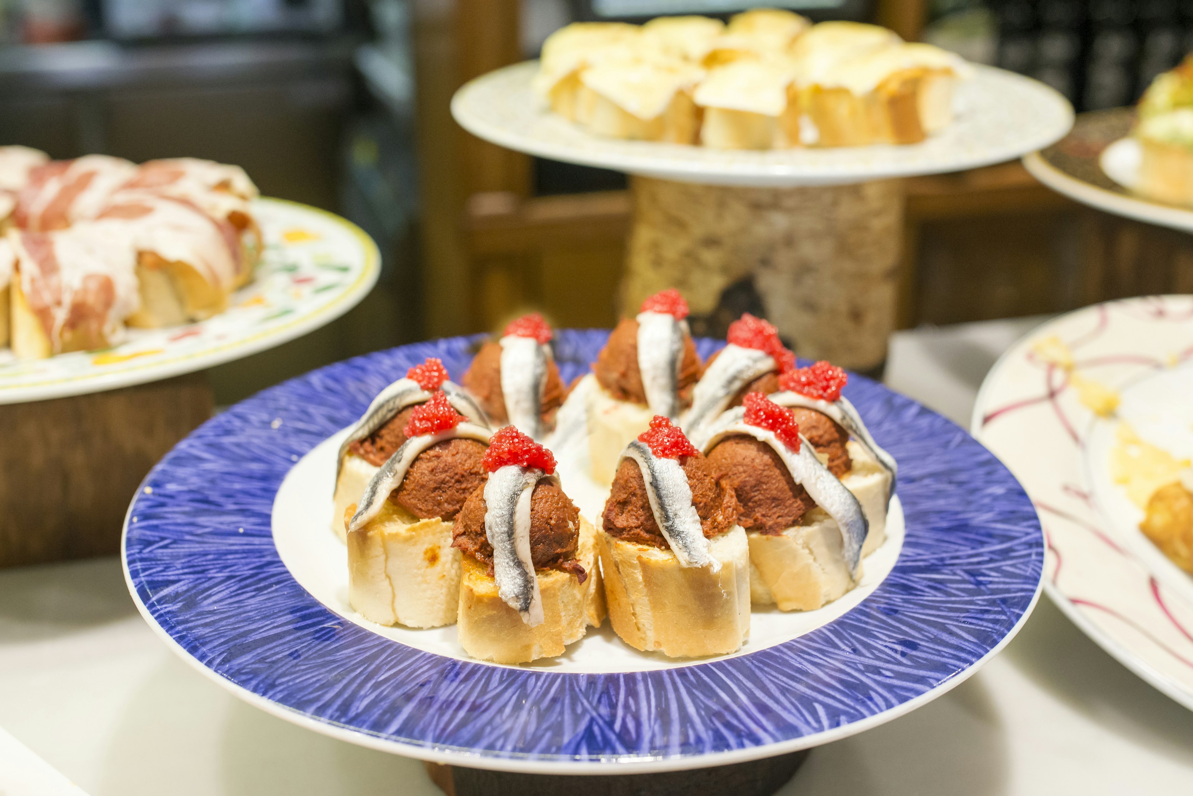 Plates of tapas are laid out on display in Bilbao, Spain.