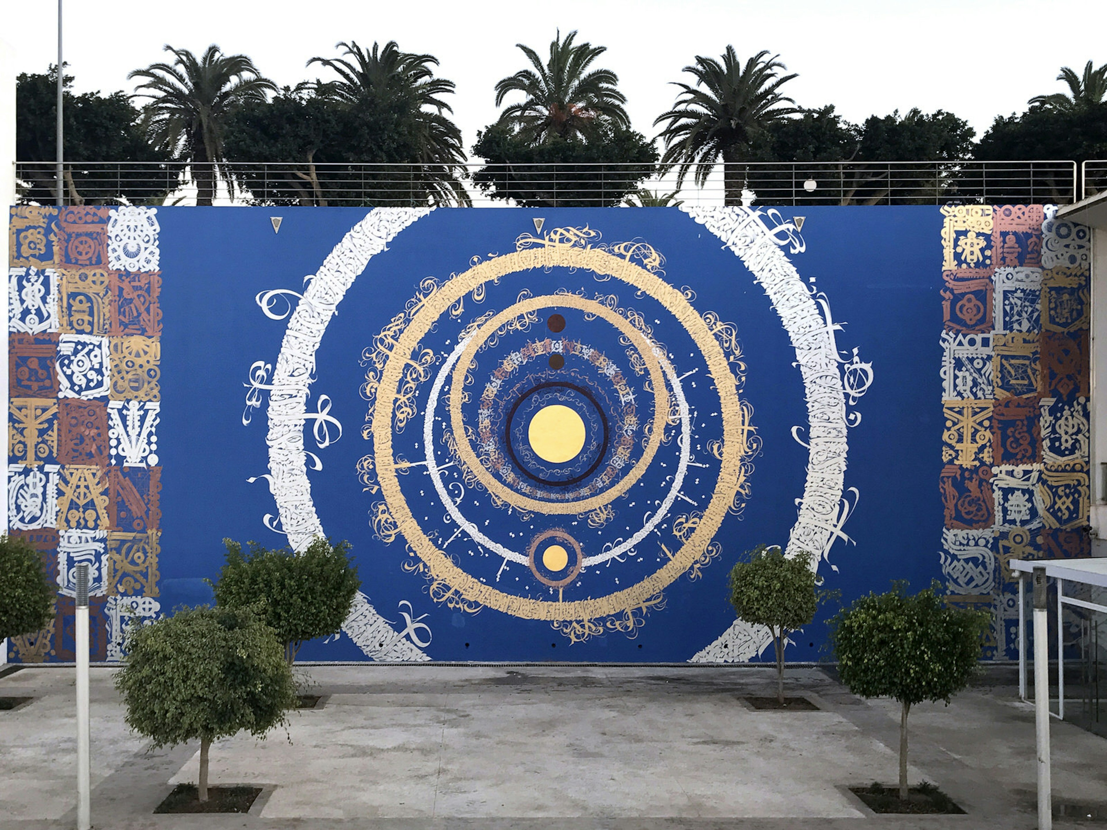 Native American, Arabic, Amazigh and Latin script circle to infinity at Dahbia by Tarek Benaoum © Christian Koopmans