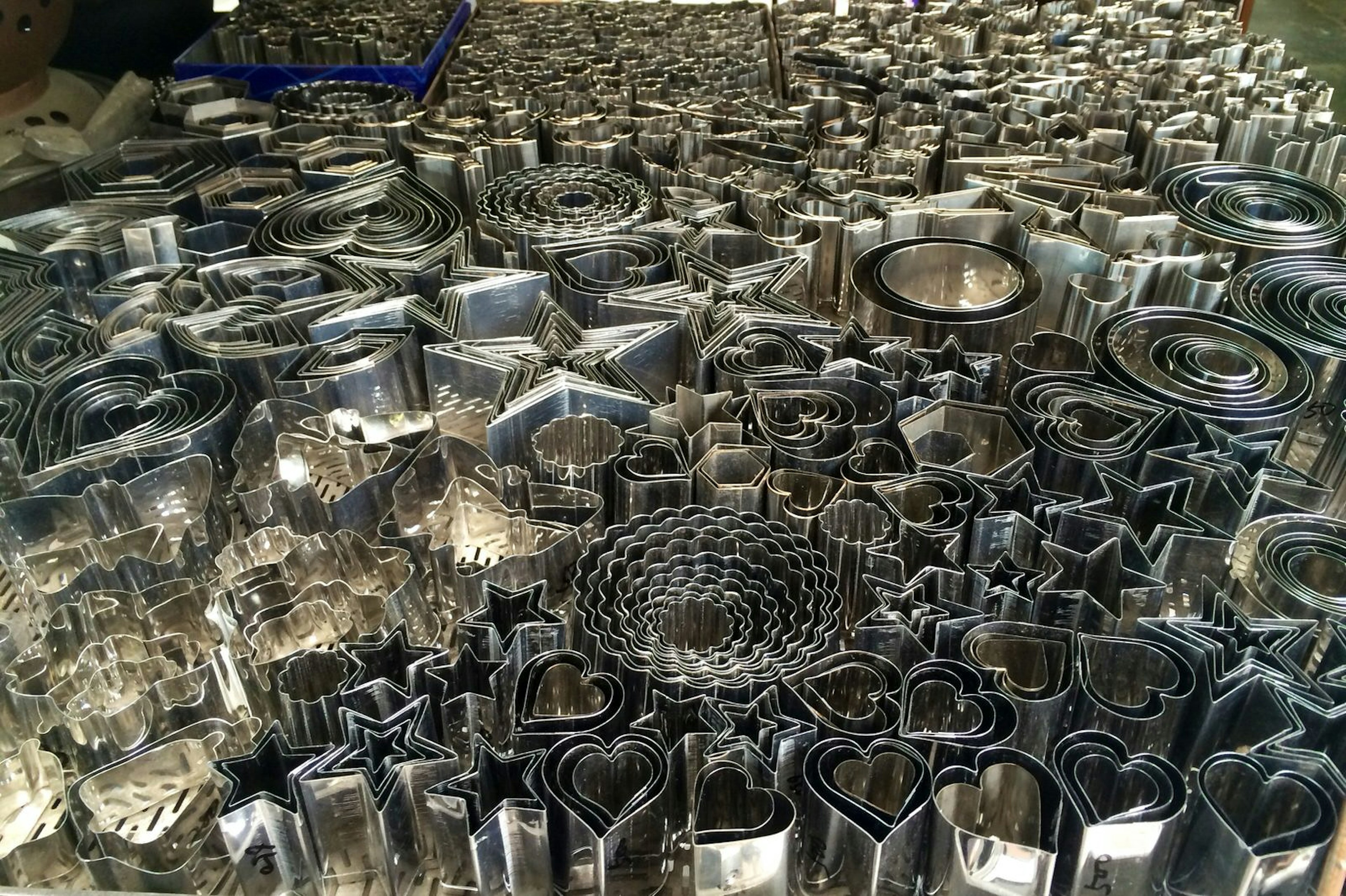 Hundreds of cookie cutters of various shapes and sizes in a store on Kappabashi-dōri