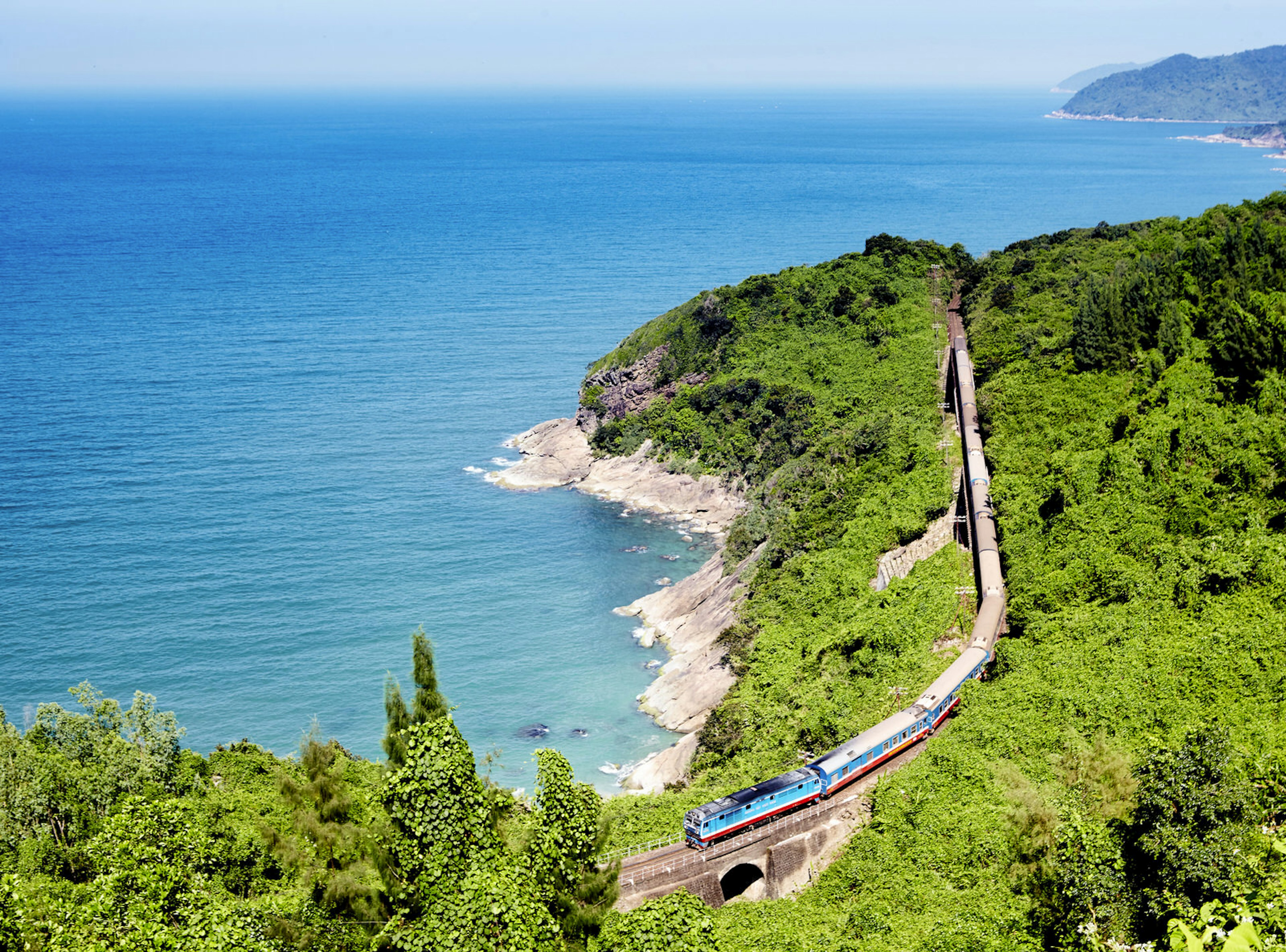 The Reunification Express running alongside the South China Sea between Hue and Hoi An © Matt Munro / Lonely Planet