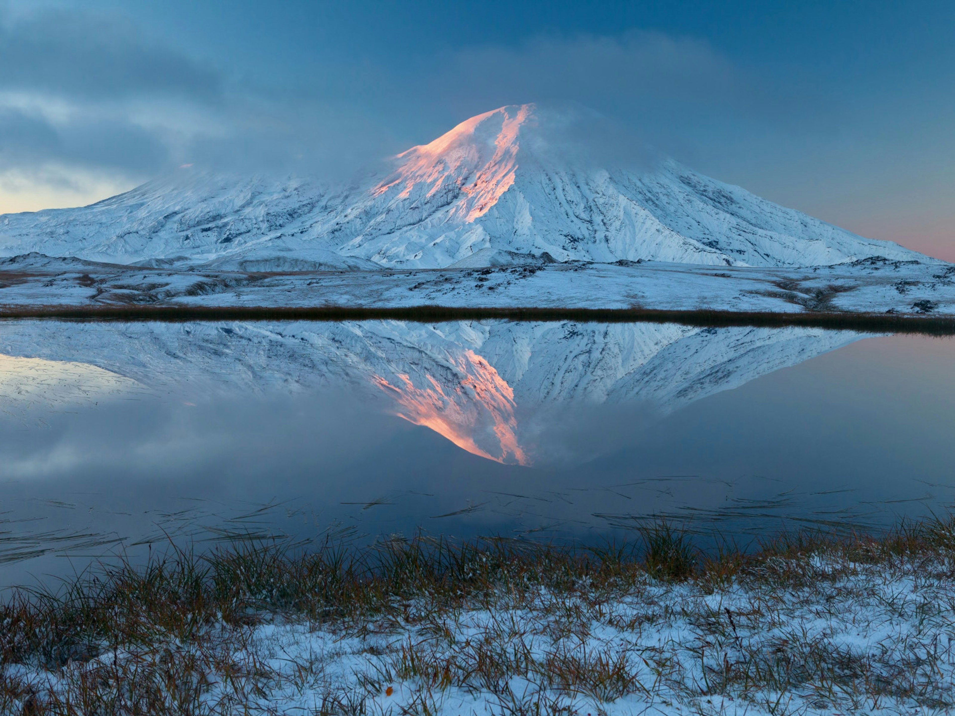 With snowcapped volcanoes, Kamchatka is a place of primal beauty © Sergey Krasnoshchekov / 500px