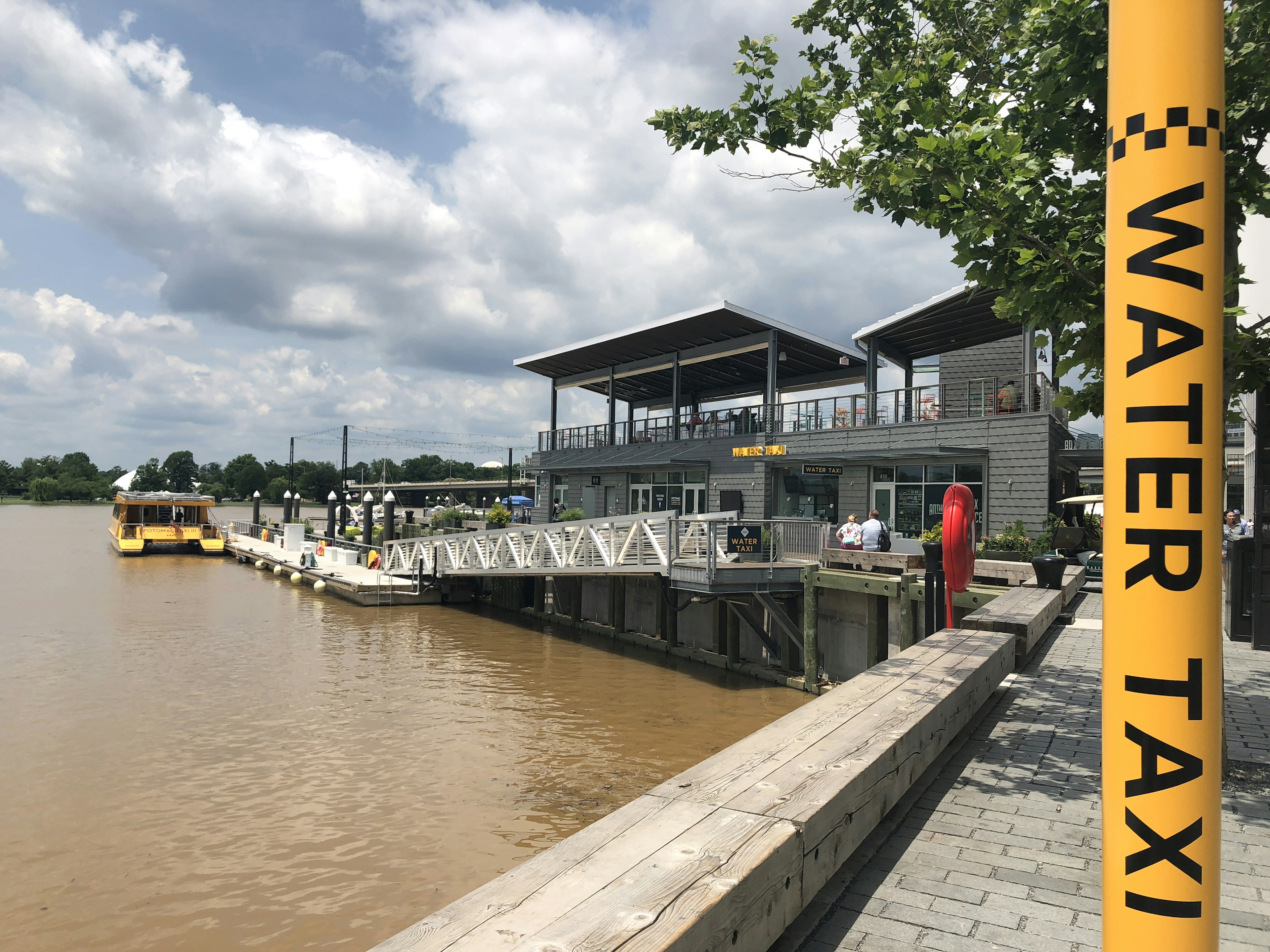 Water taxi parked at a pier on the Potomac at the Wharf District in DC © Trisha Ping / iBestTravel