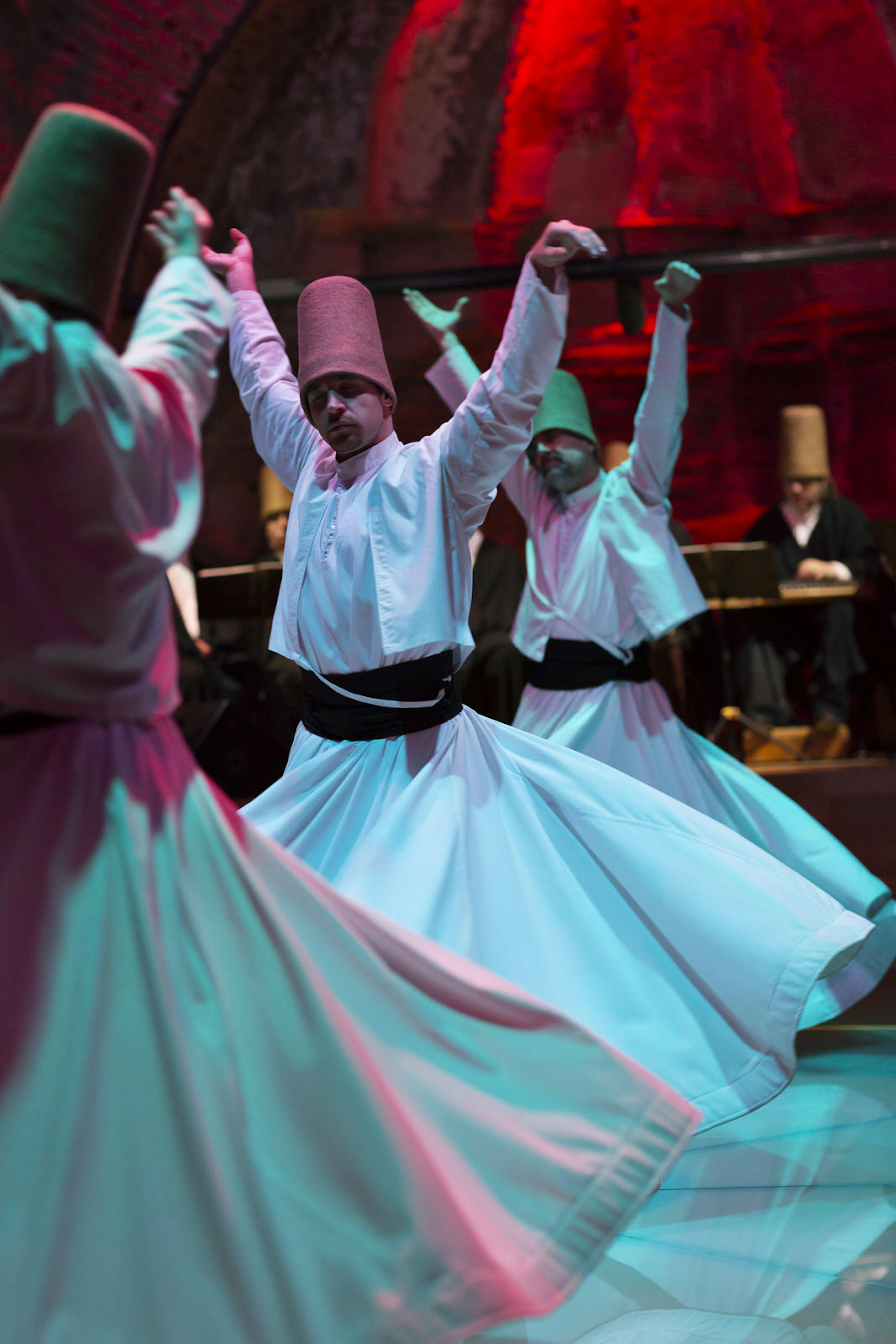 Whirling Dervishes and Musicians Perform-Istanbul -Turkey 11-02-2013; Shutterstock ID 555570193; Your name (First / Last): Lauren Keith; GL account no.: 65050; Netsuite department name: Online Editorial; Full Product or Project name including edition: Hidden Cairo article