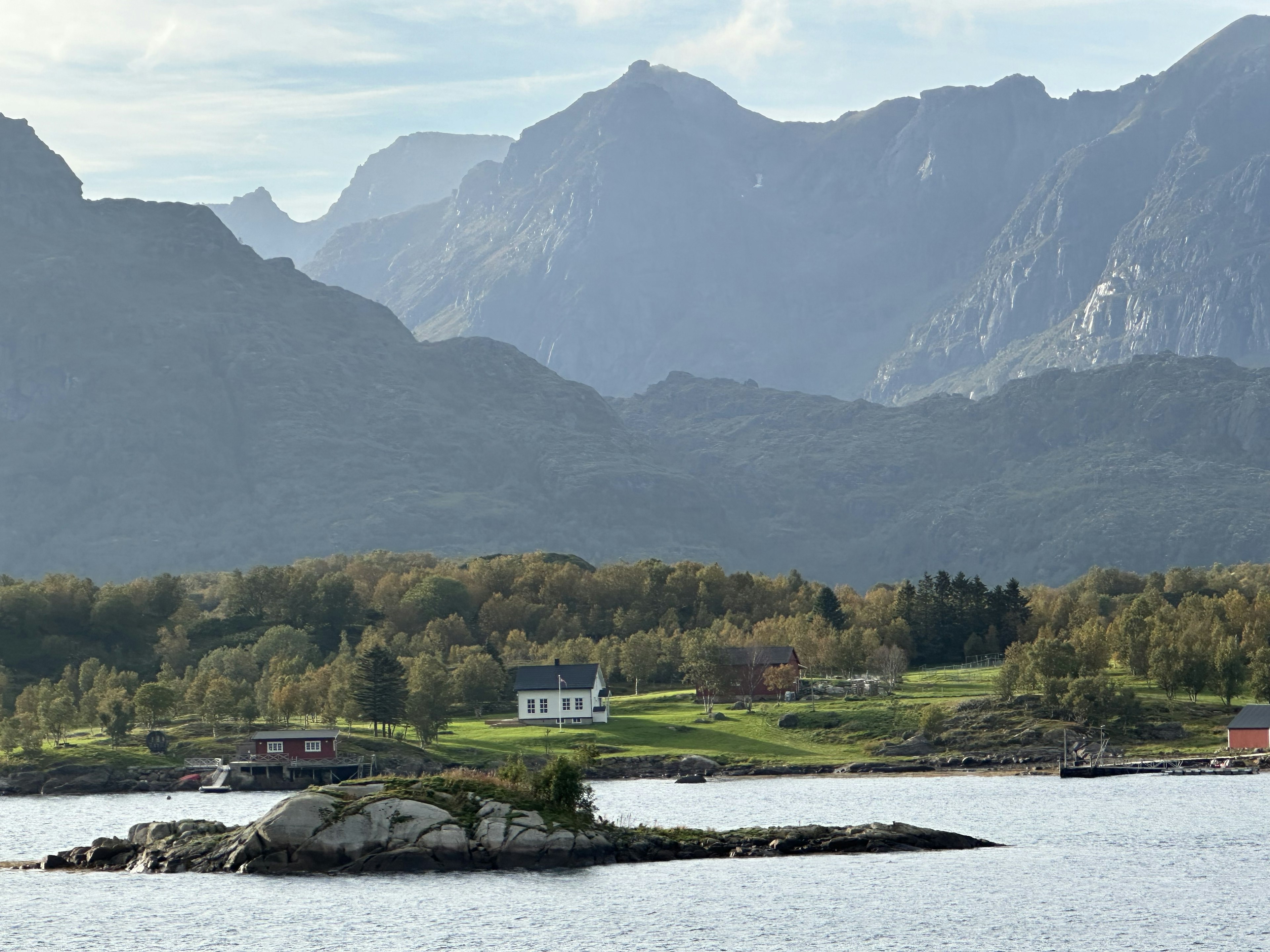 Homes on coastal shoreline in Norway.