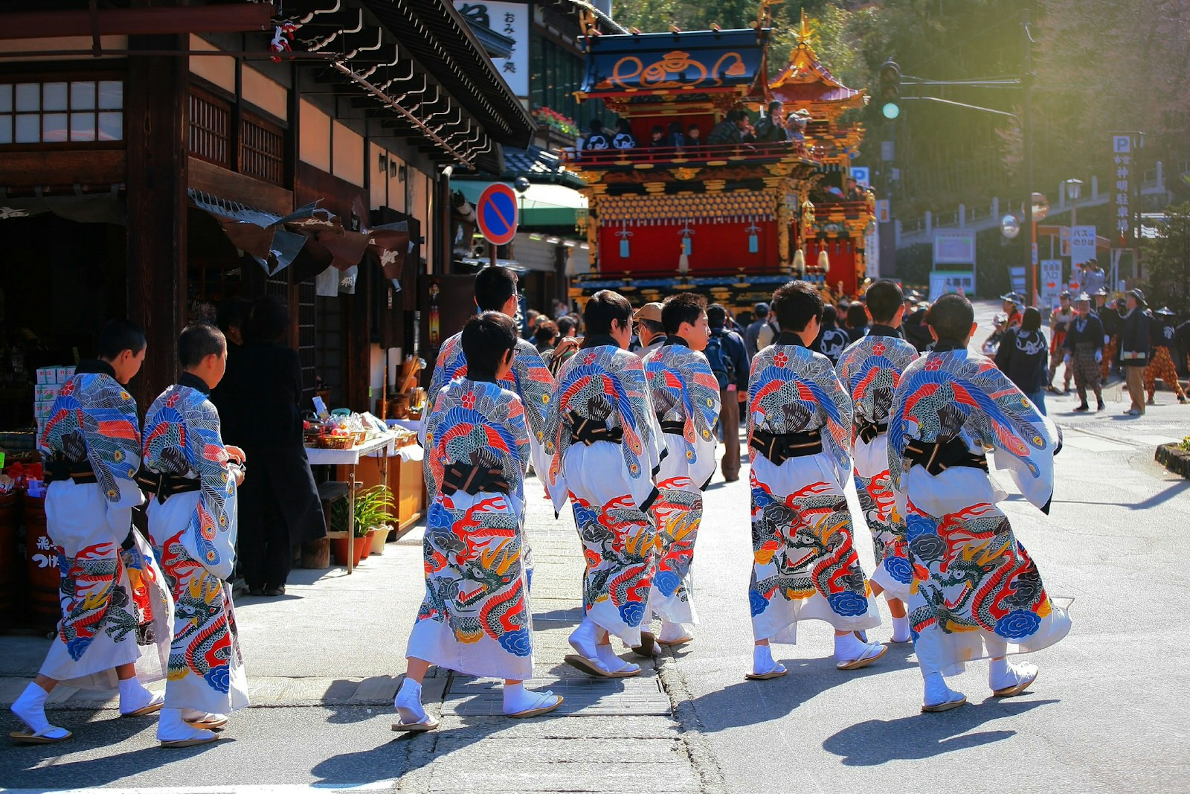 Tokyo summer - Children wearing traditional yukata attend a festival in the afternoon sun