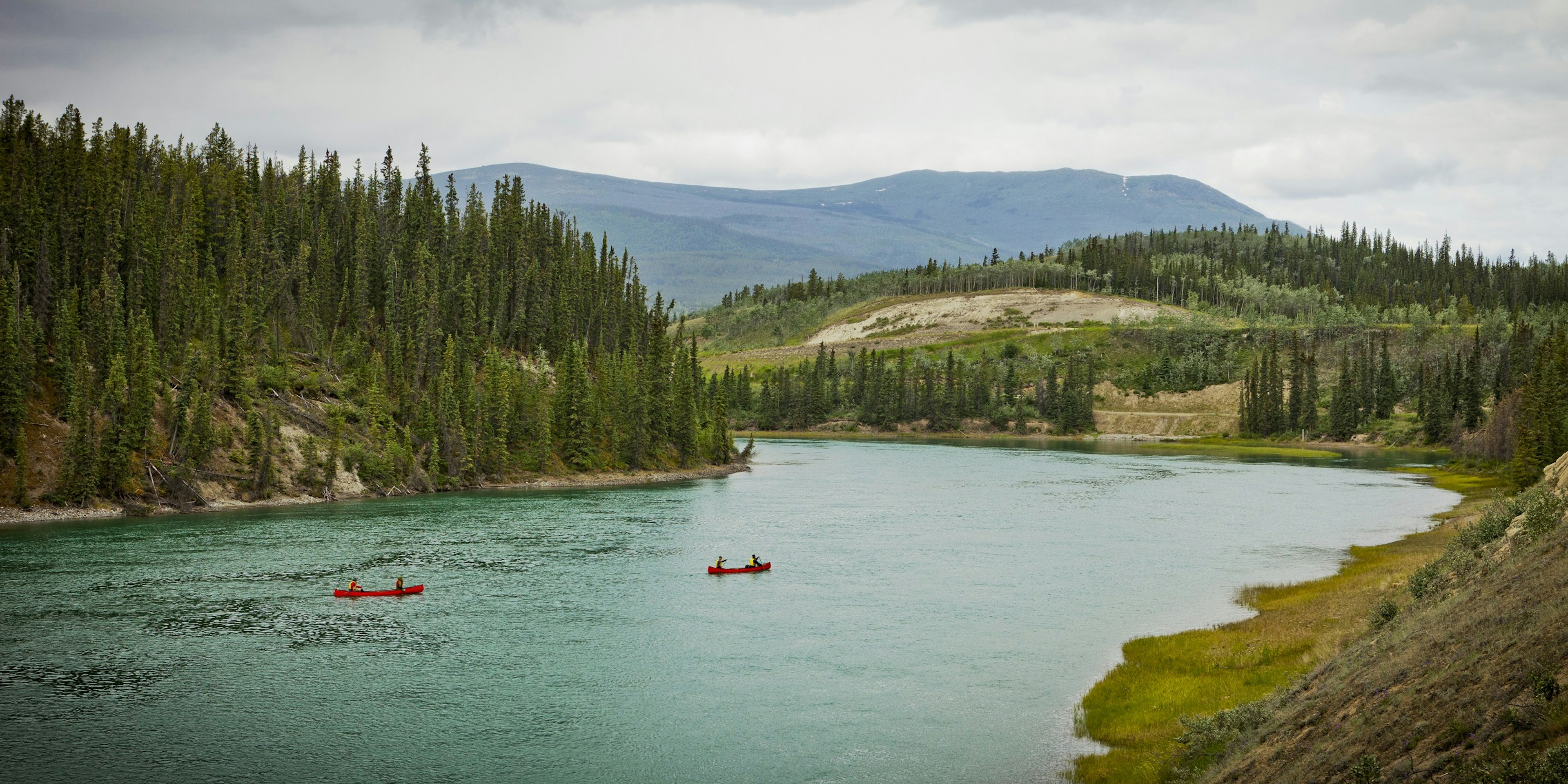 Paddling the Yukon River and wild camping under the summer's midnight sun is an unforgettable adventure