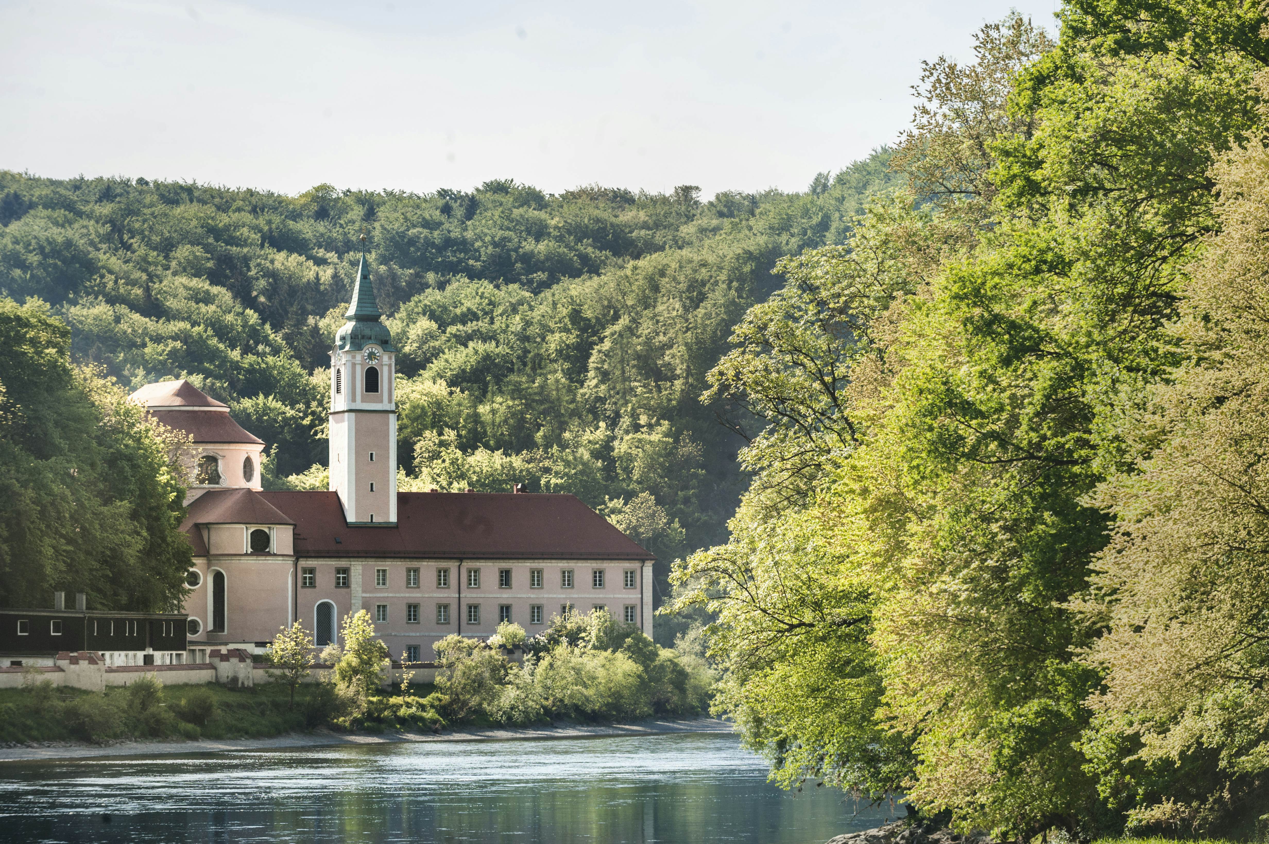 The Weltenburg monastery sits in a beautiful wooded hollow on the banks of the Danube River in Bavaria, Germany