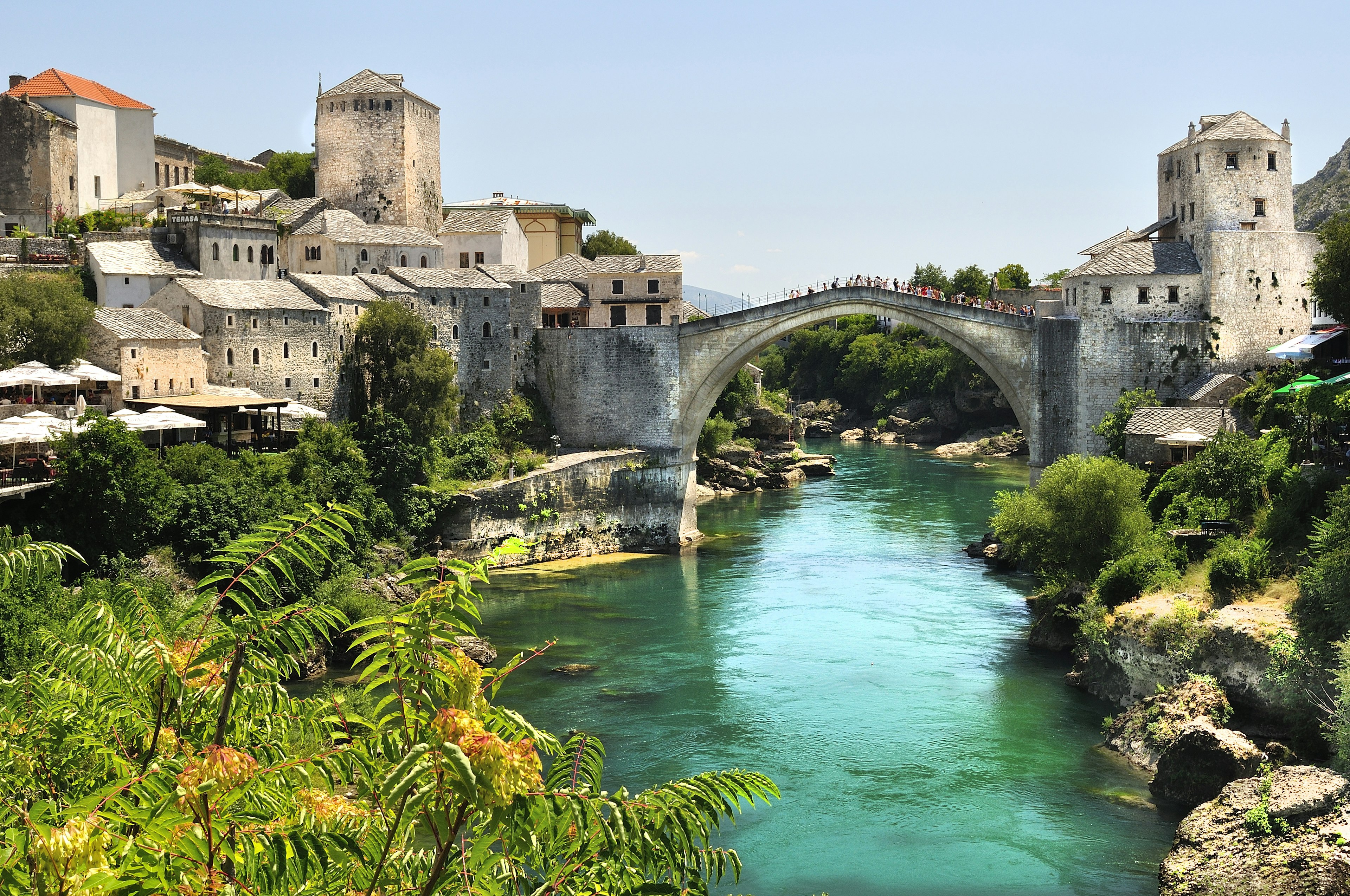 The elegant arch of Stari Bridge spans the turquoise waters of the river Neretva