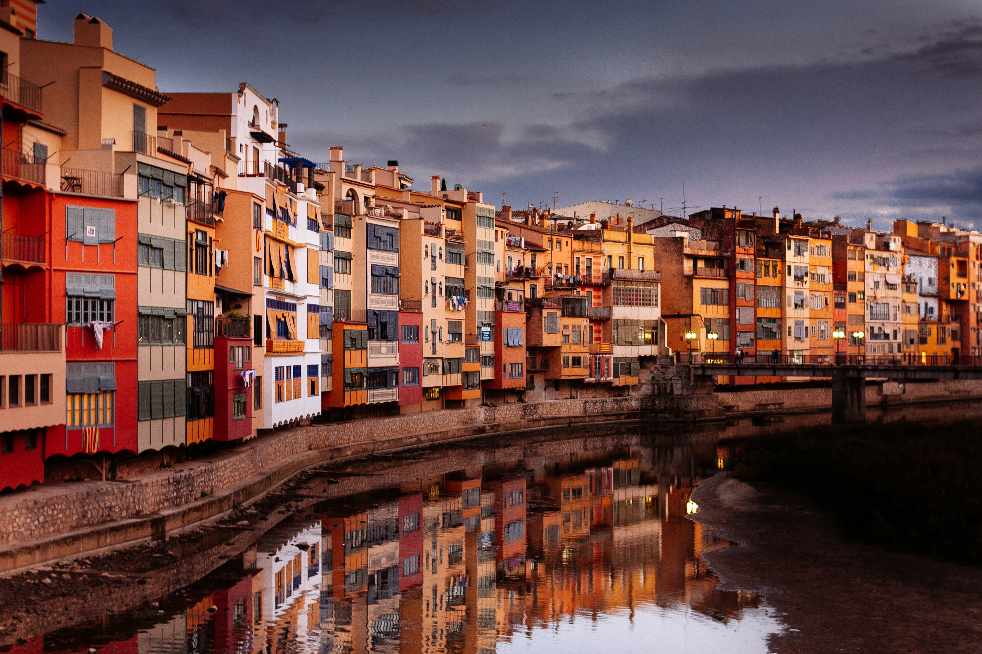 Residential buildings along canal, Girona, Catalunya, Spain.