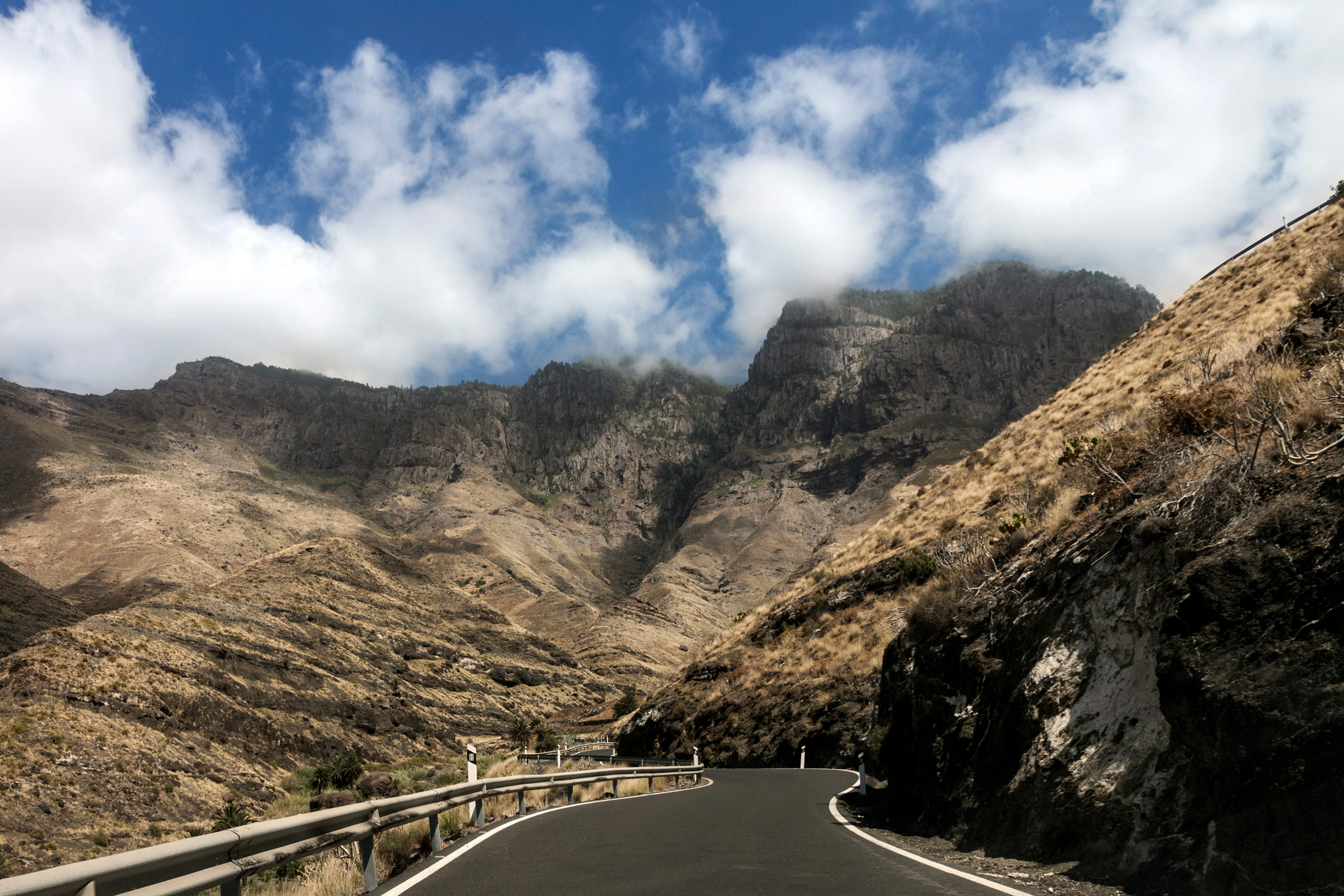 Empty mountain road, Gran Canaria with blue skies and clouds